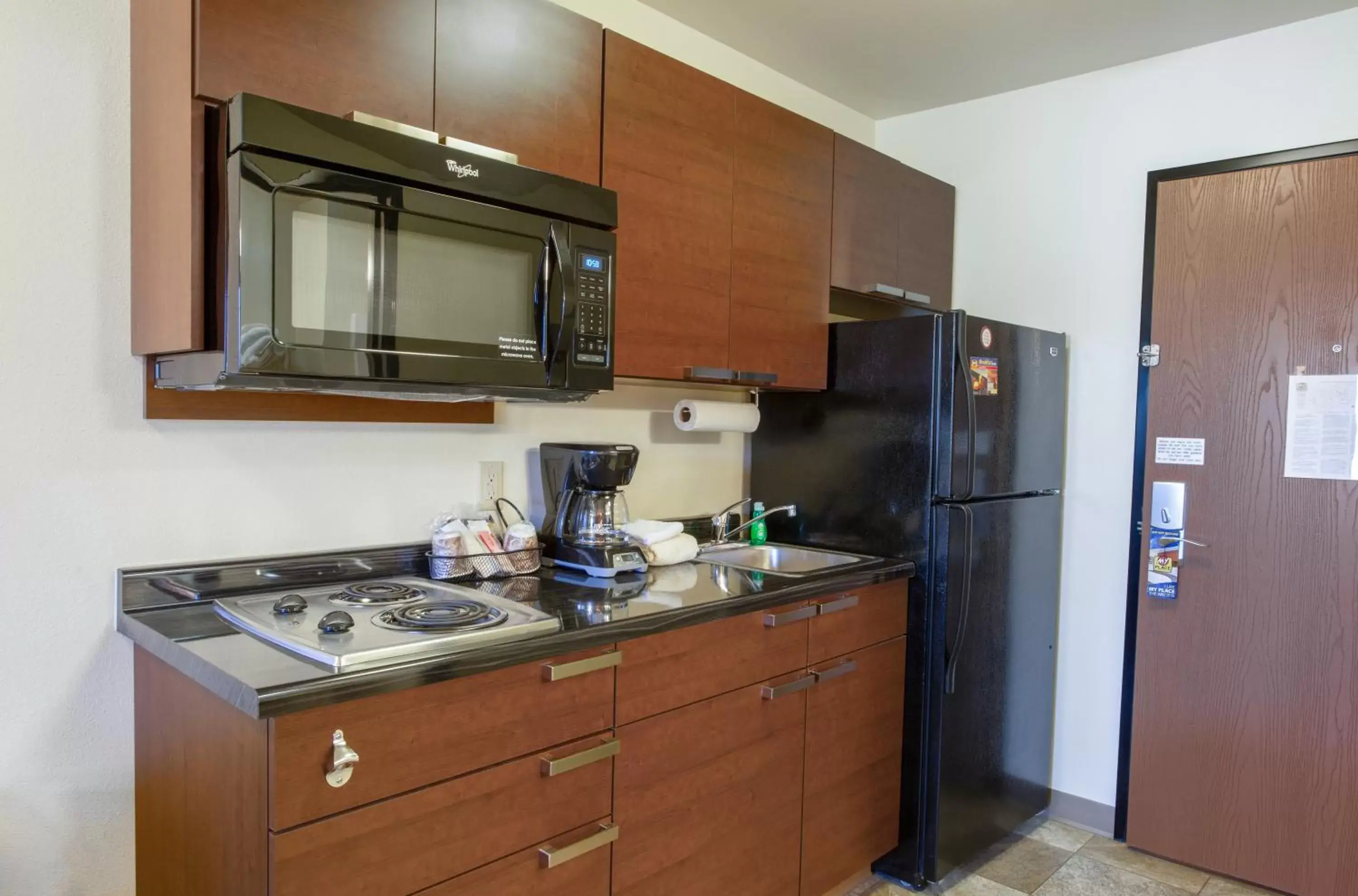 Kitchen or kitchenette, Kitchen/Kitchenette in My Place Hotel-Bismarck, ND