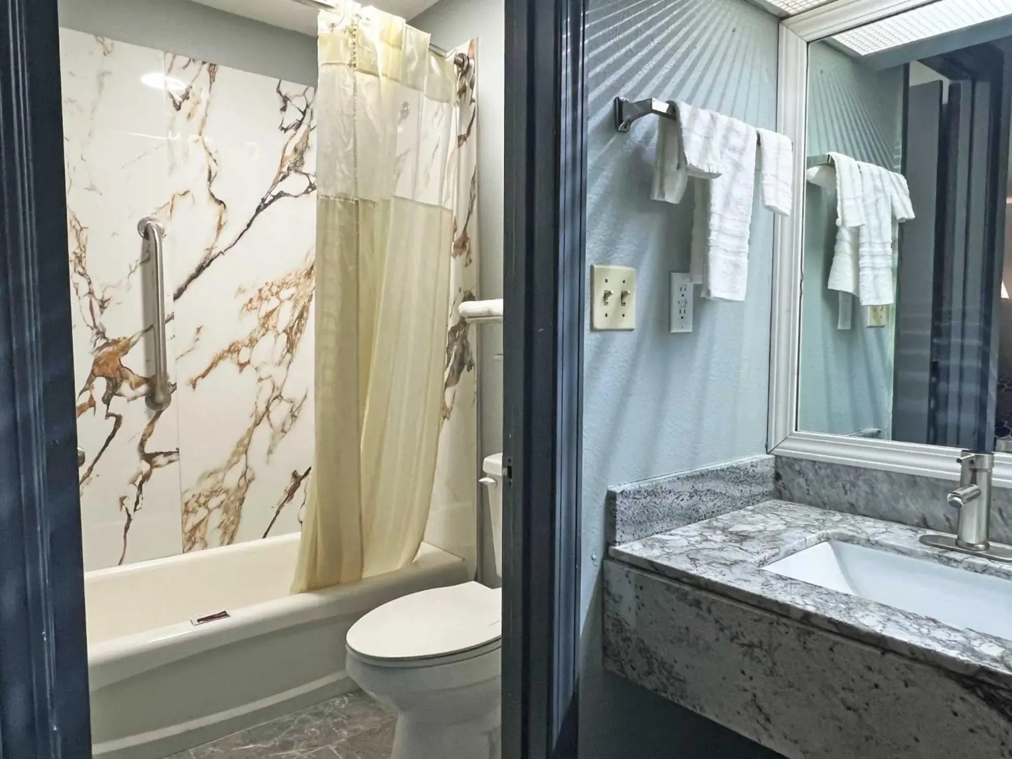 Shower, Bathroom in Red Carpet Inn and Suites Newnan GA