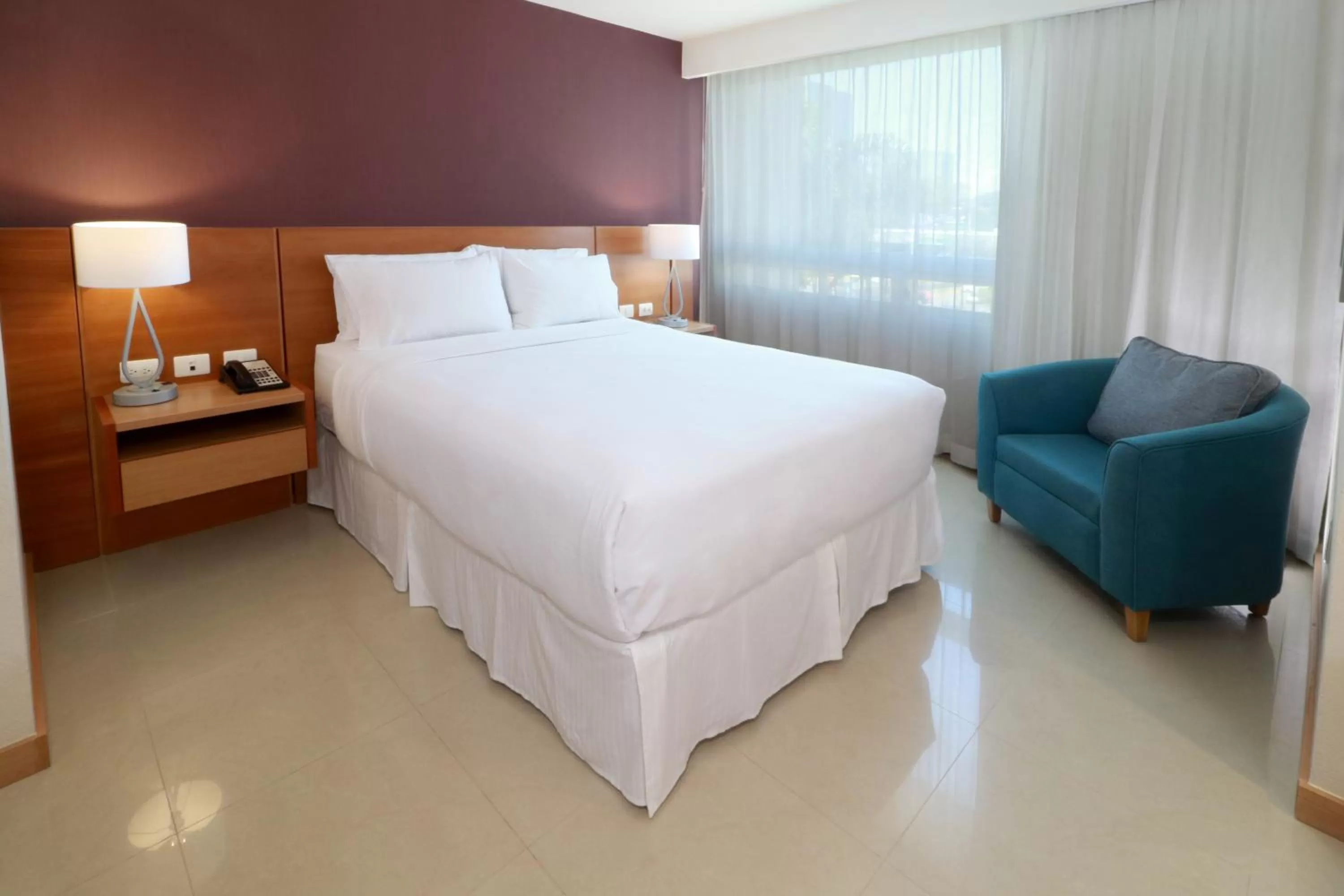 Bed in Staybridge Suites Guadalajara Expo by IHG