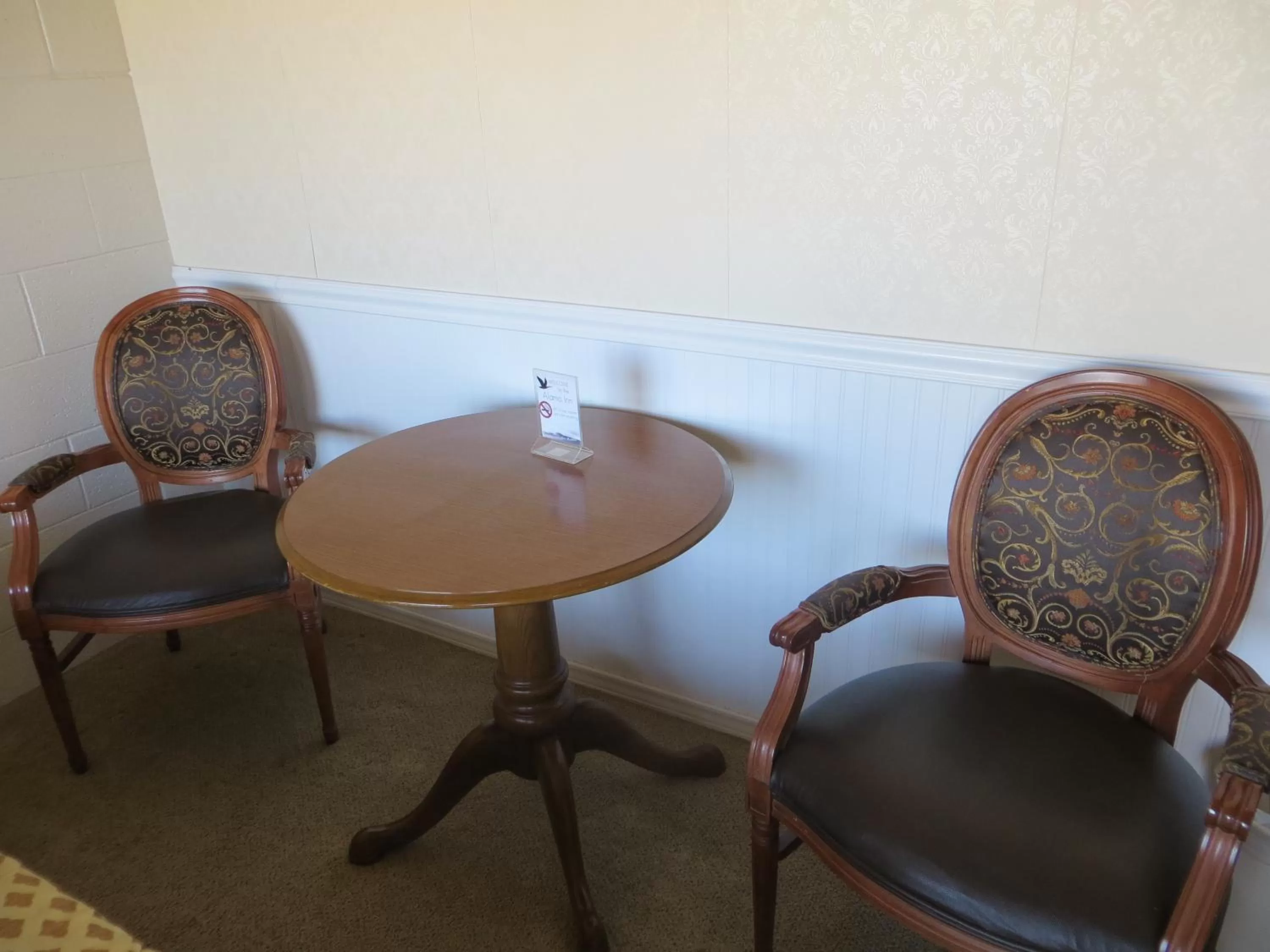 Seating area in Alamo Inn