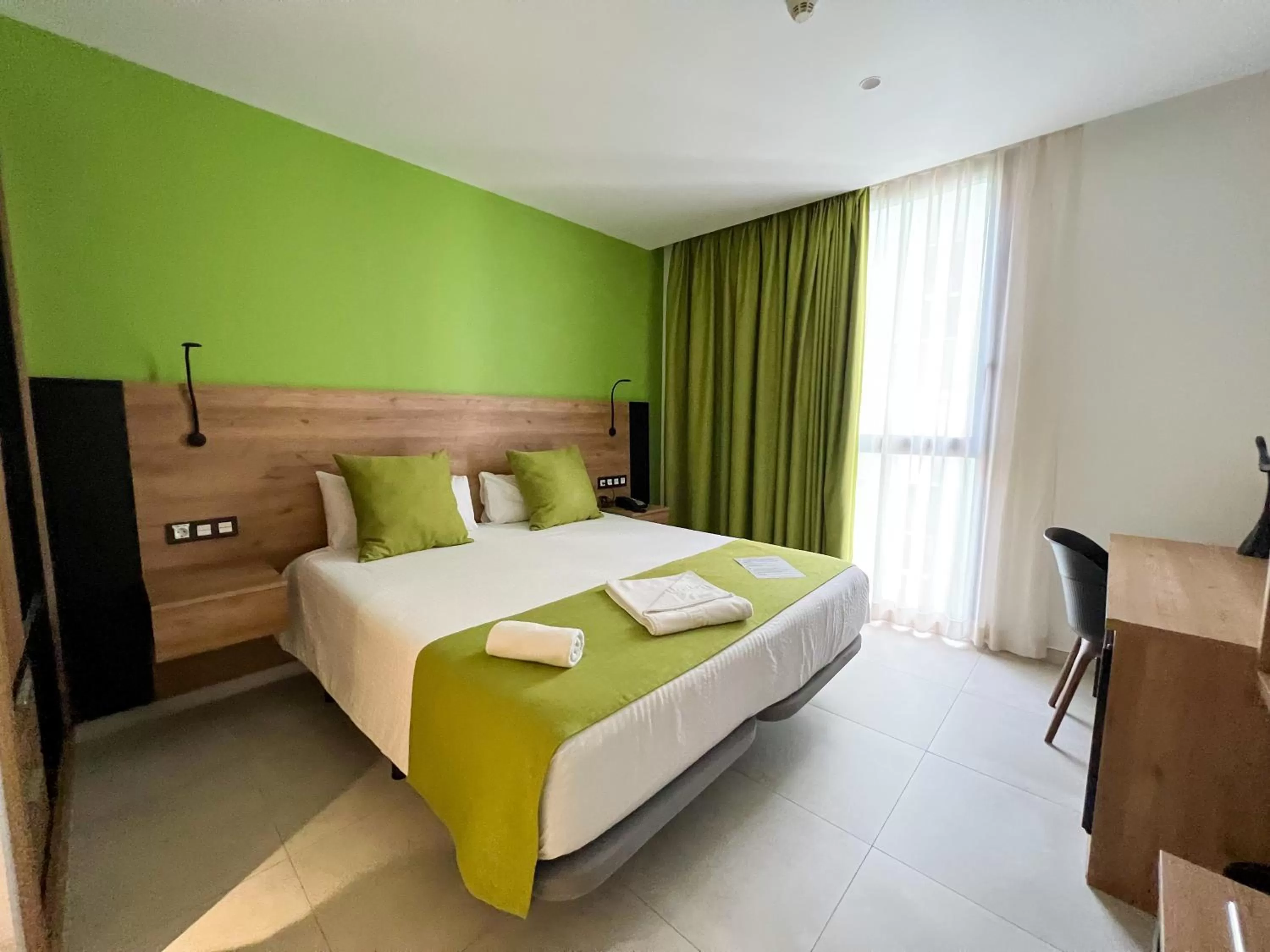 Bed in Hotel MG Poniente