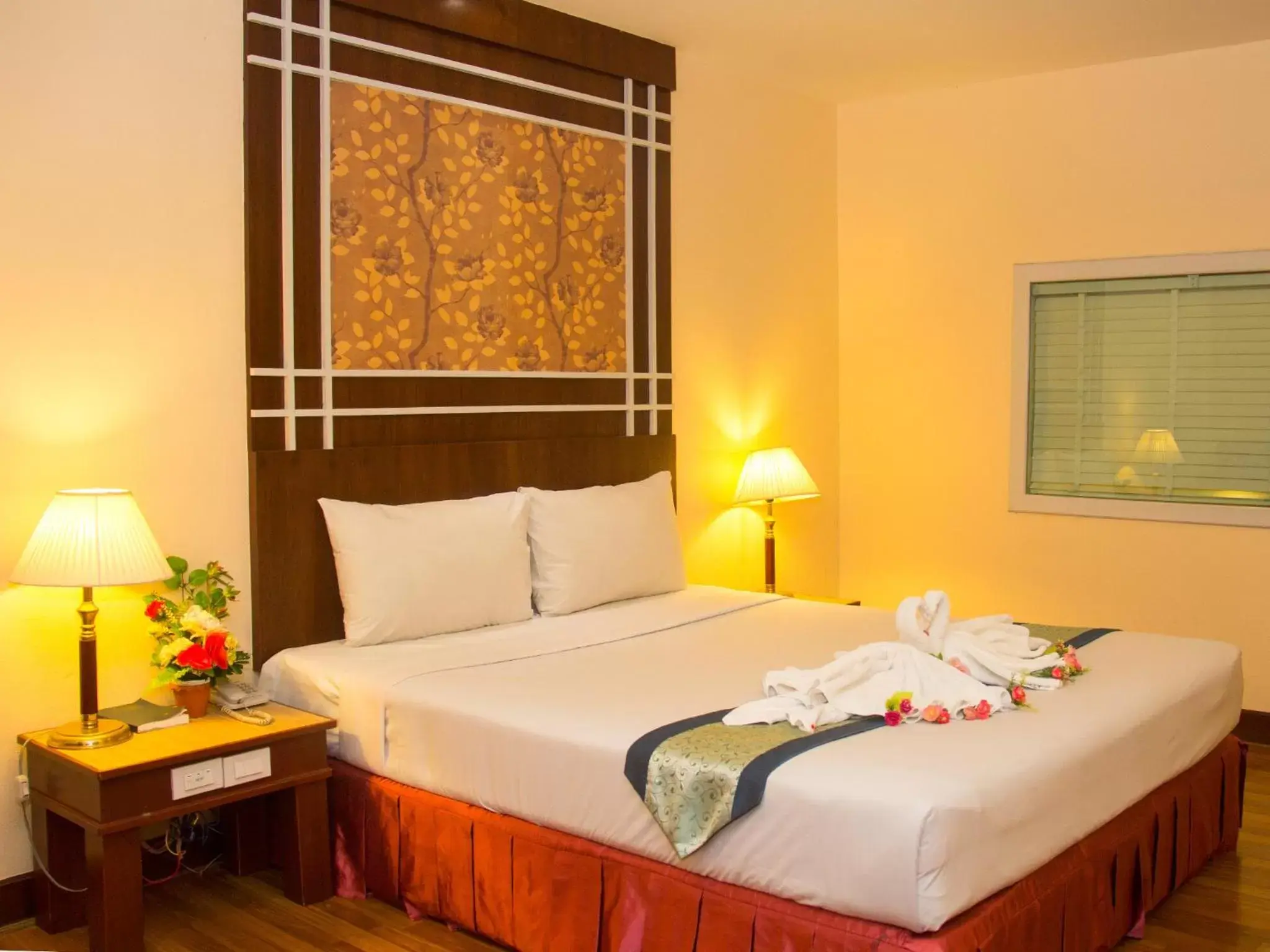 Bed in Friendlytel Hotel