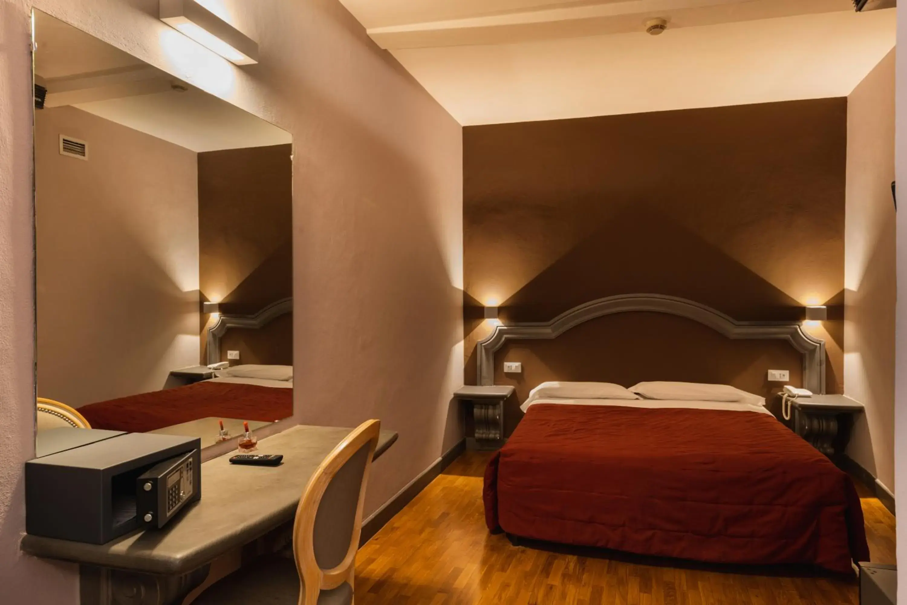 Bedroom in Hotel Unicorno