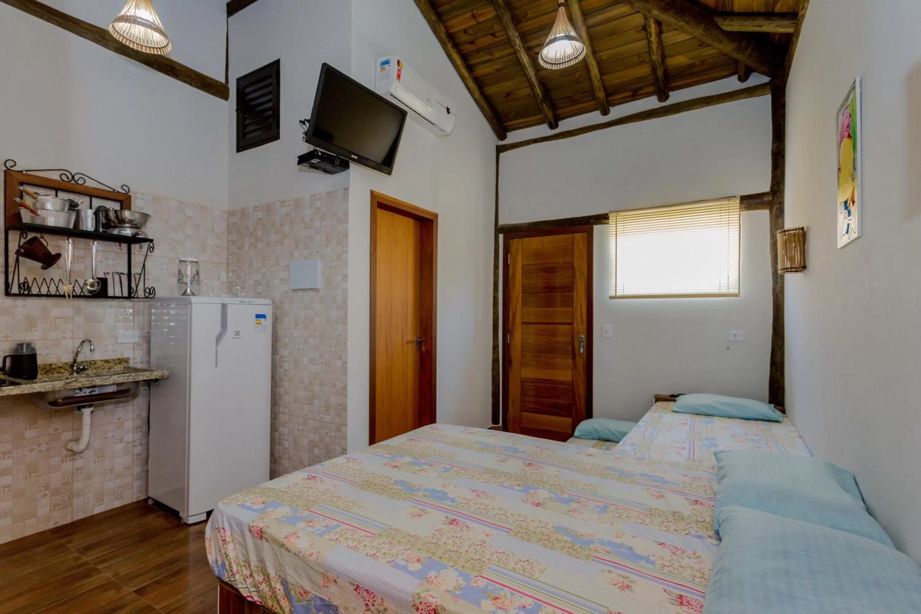 Photo of the whole room, Bed in Pousada Chalés do Julião