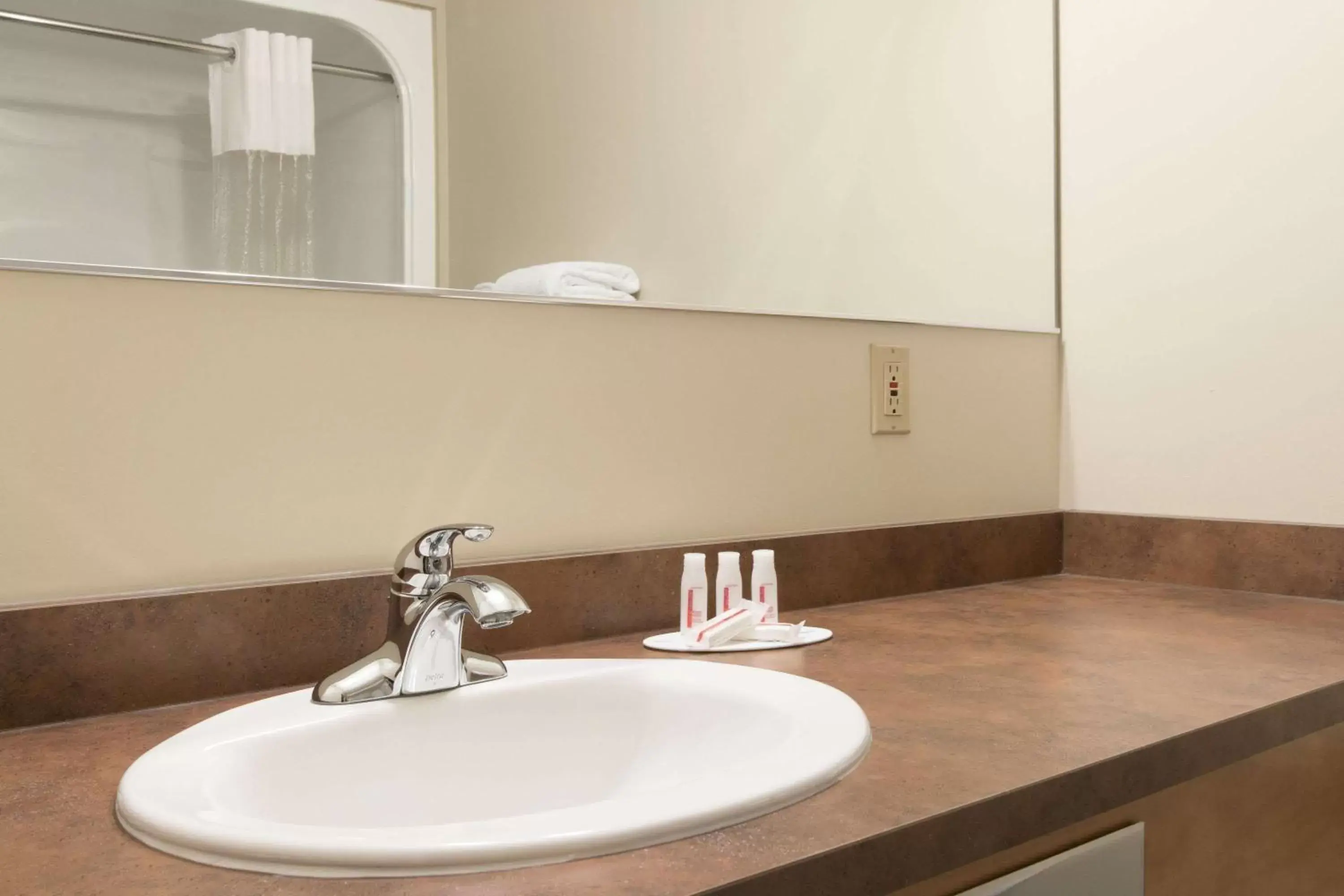 Bathroom in Days Inn & Suites by Wyndham Thunder Bay