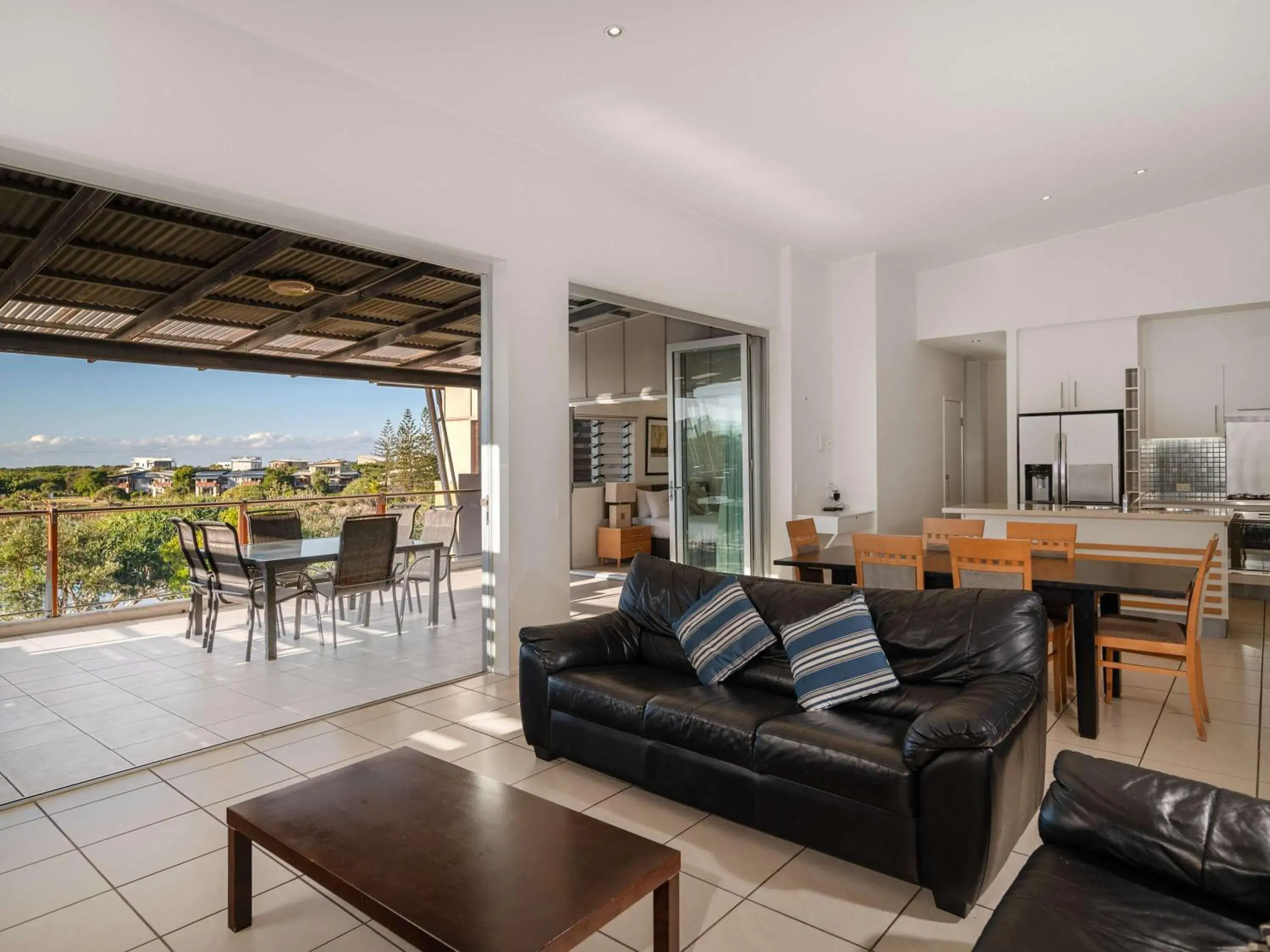 Bedroom, Seating Area in The Sebel Twin Waters