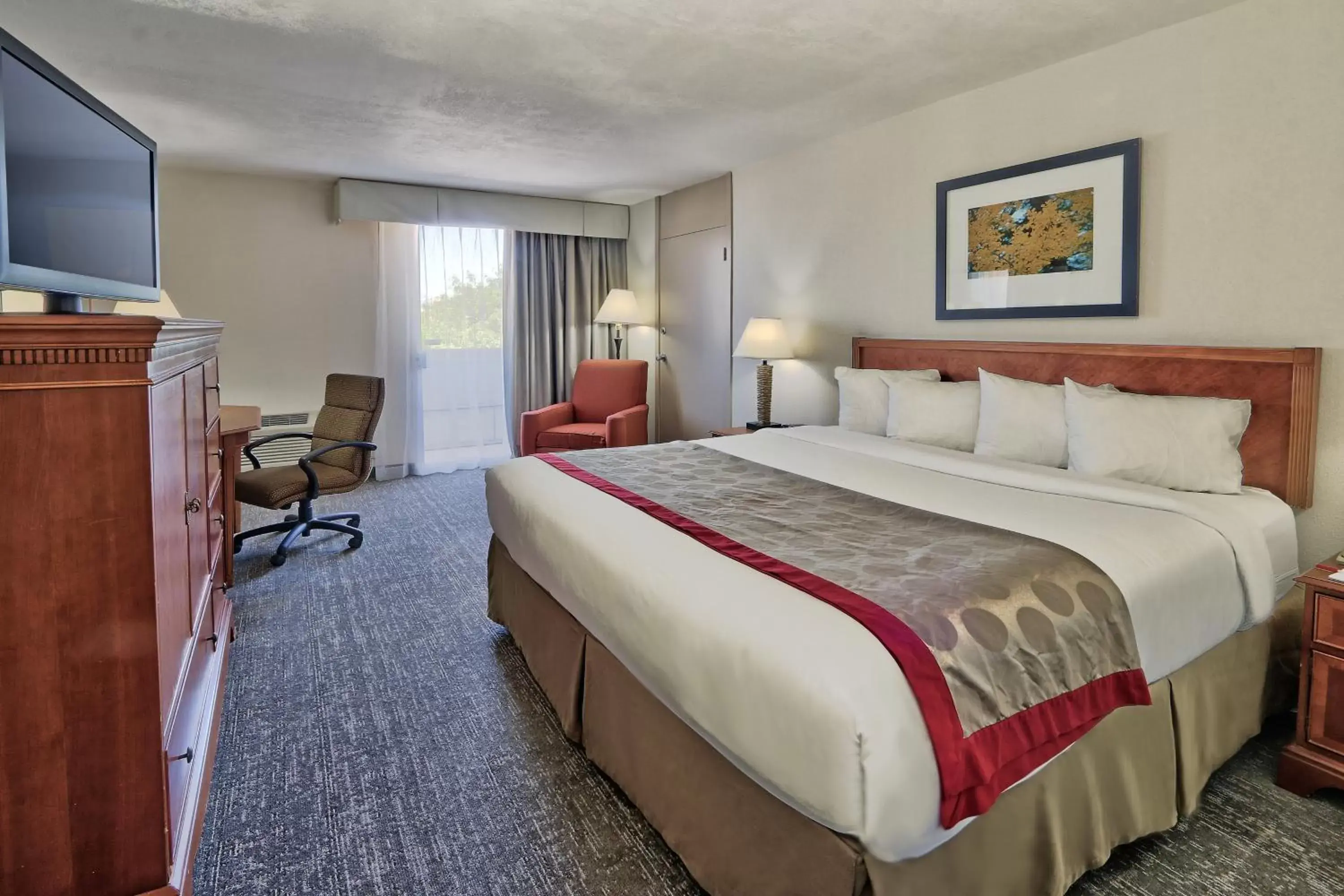 Bed in Ramada by Wyndham Albuquerque Midtown