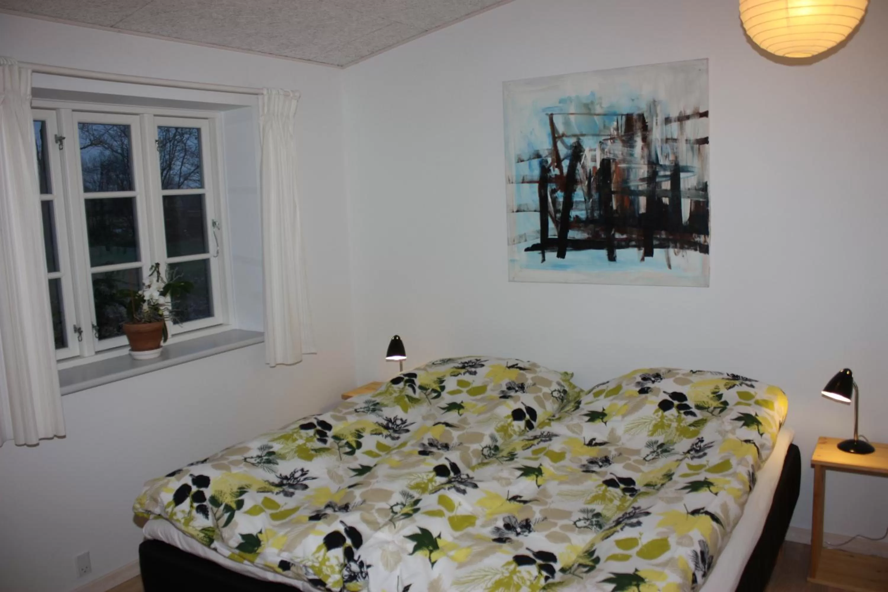 Bed in Holmehuset Bed & Breakfast