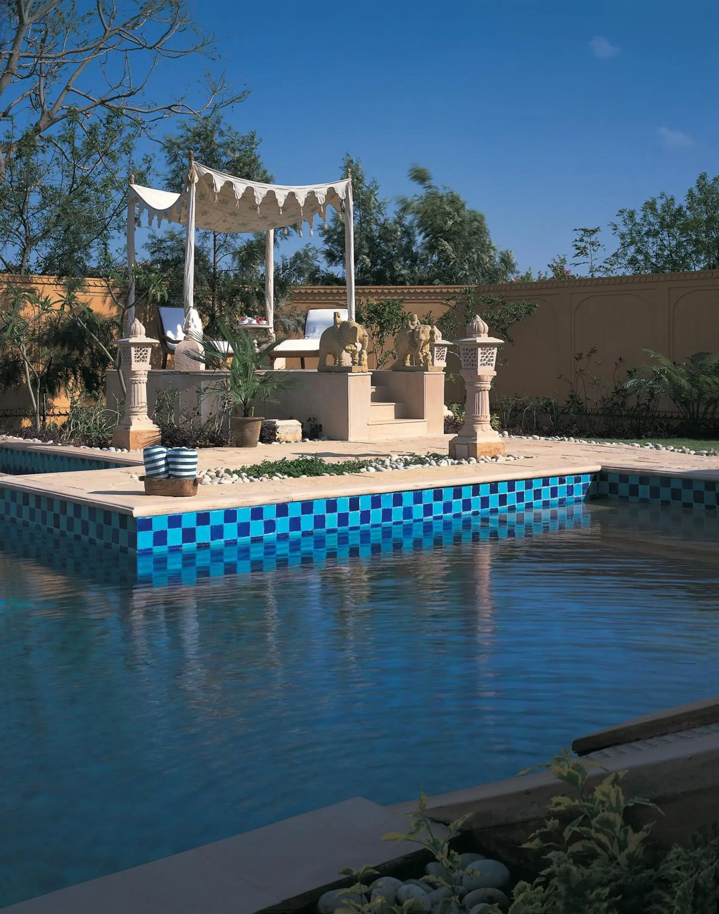 Seating area, Swimming Pool in The Oberoi Rajvilas Jaipur