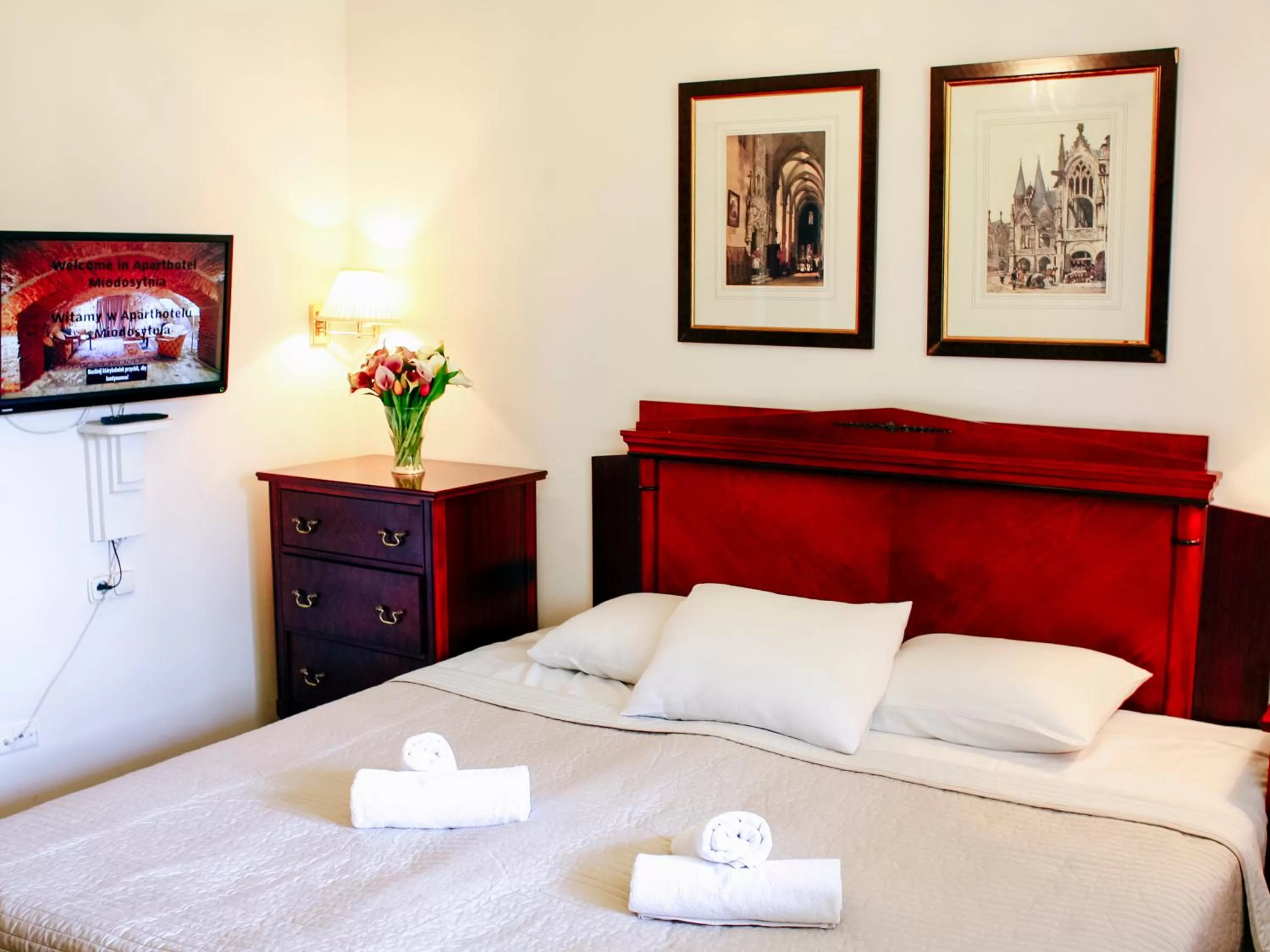 Bed in Miodosytnia Aparthotel