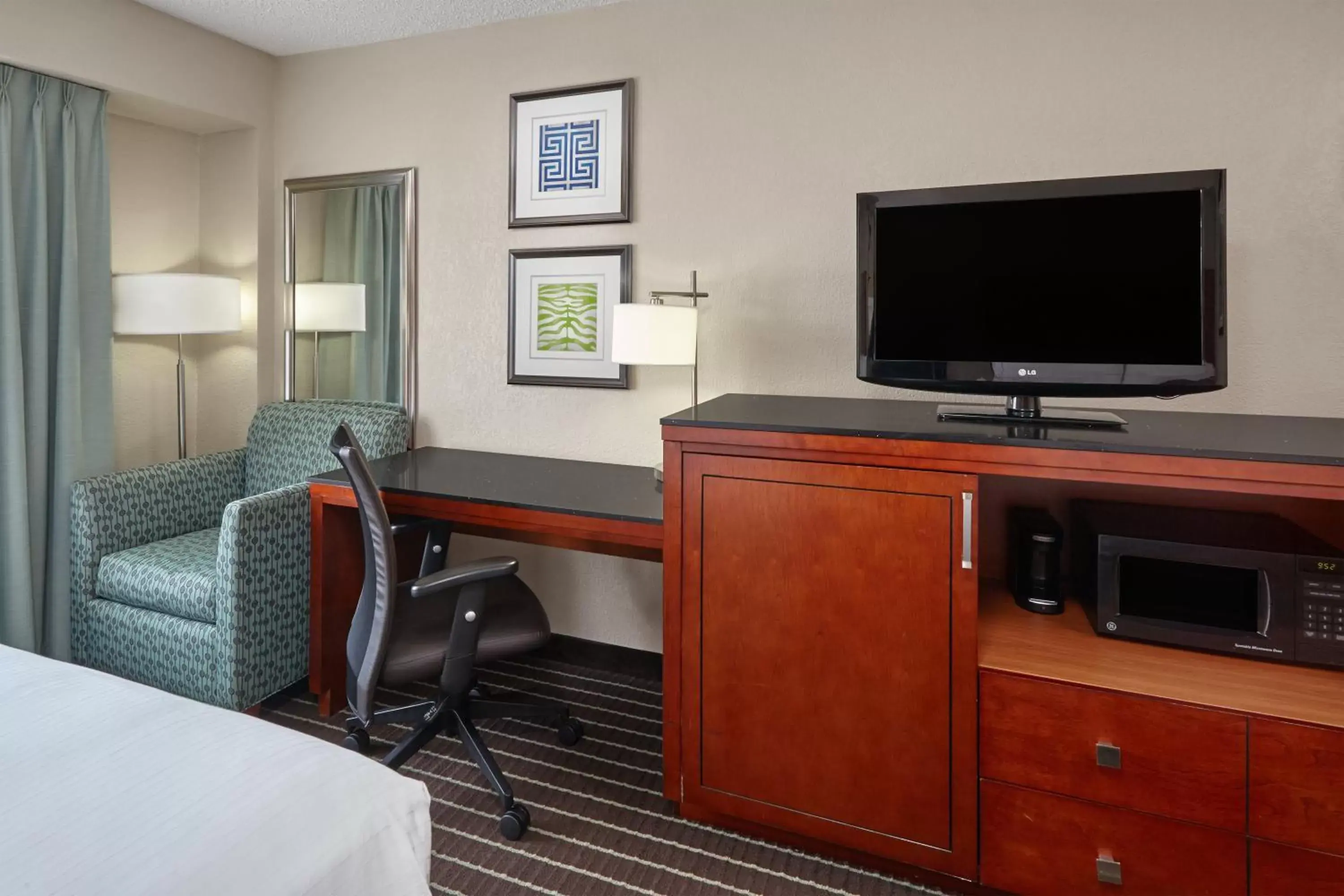 Photo of the whole room, TV/Entertainment Center in Holiday Inn Express Hotels- Hampton, an IHG Hotel