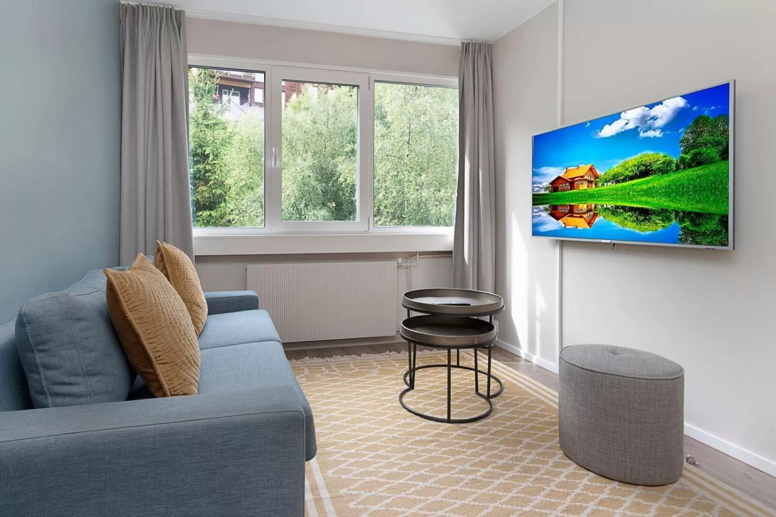 Communal lounge/ TV room in Førde Hotel - Unike Hoteller