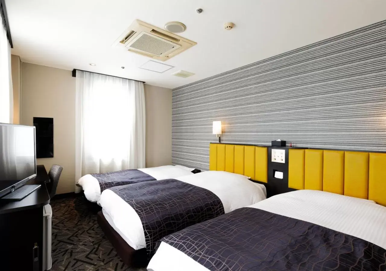 Photo of the whole room, Bed in APA Hotel Fukuoka Yukuhashi Ekimae