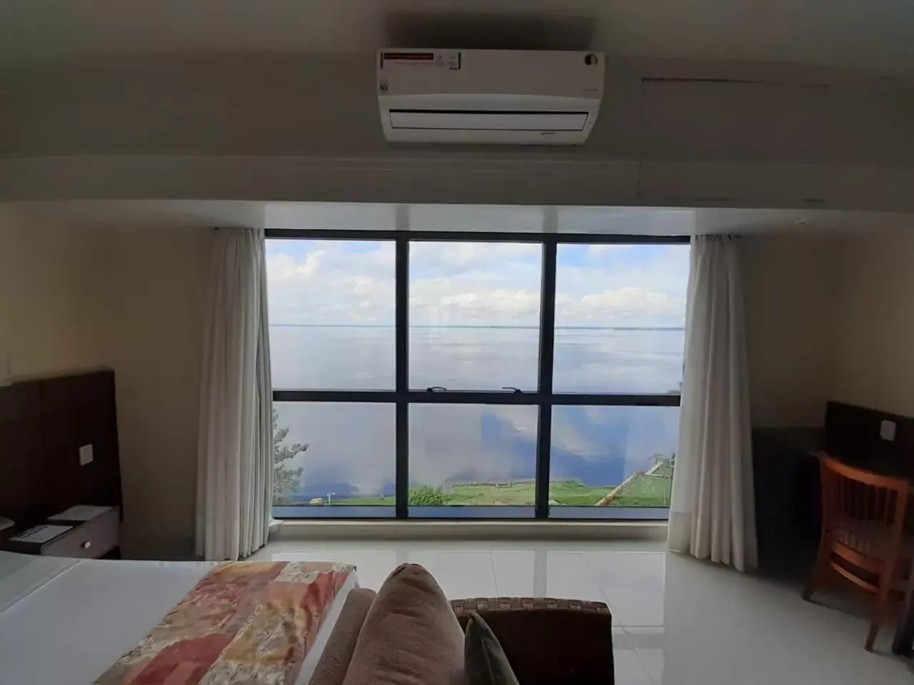 River view, Bed in Tropical Executive Hotel River view, Bed in Tropical Executive Hotel