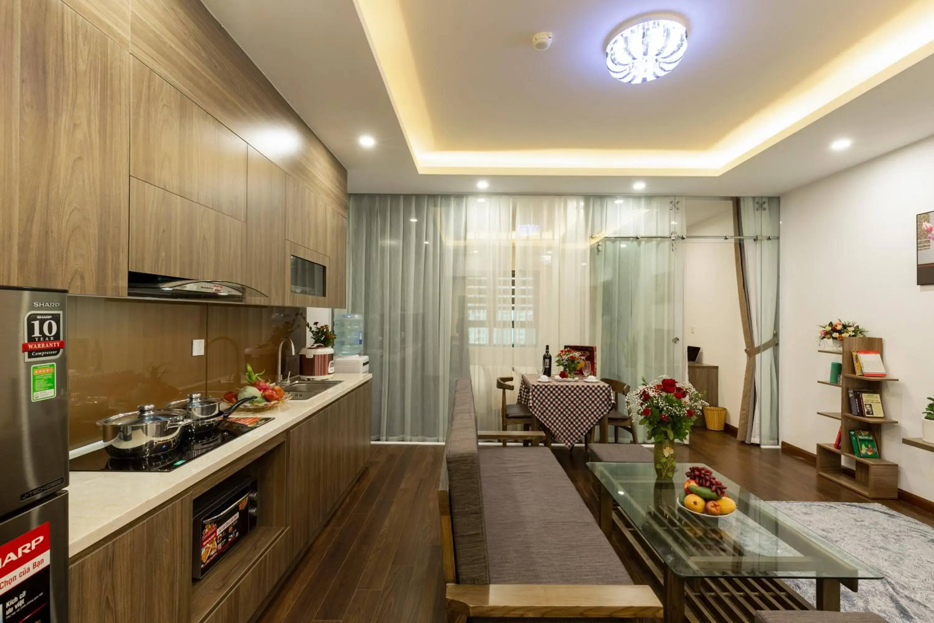 Living room, Kitchen/Kitchenette in Bao Hung Hotel and Apartment