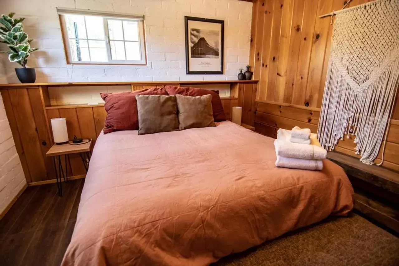 Bed in Lake Front Cabins