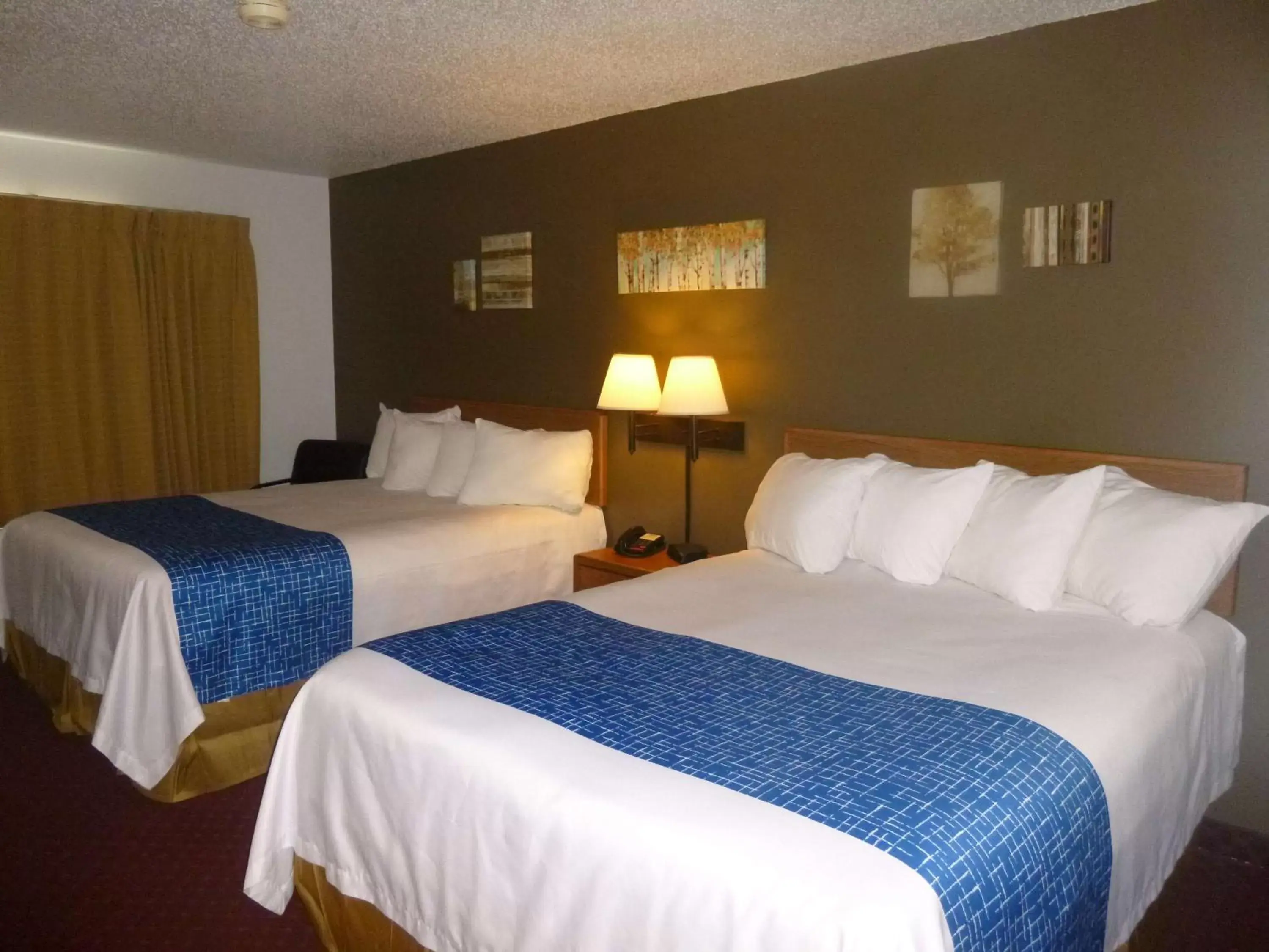 Queen Room with Two Queen Beds - Non-Smoking in Travelodge by Wyndham Spearfish
