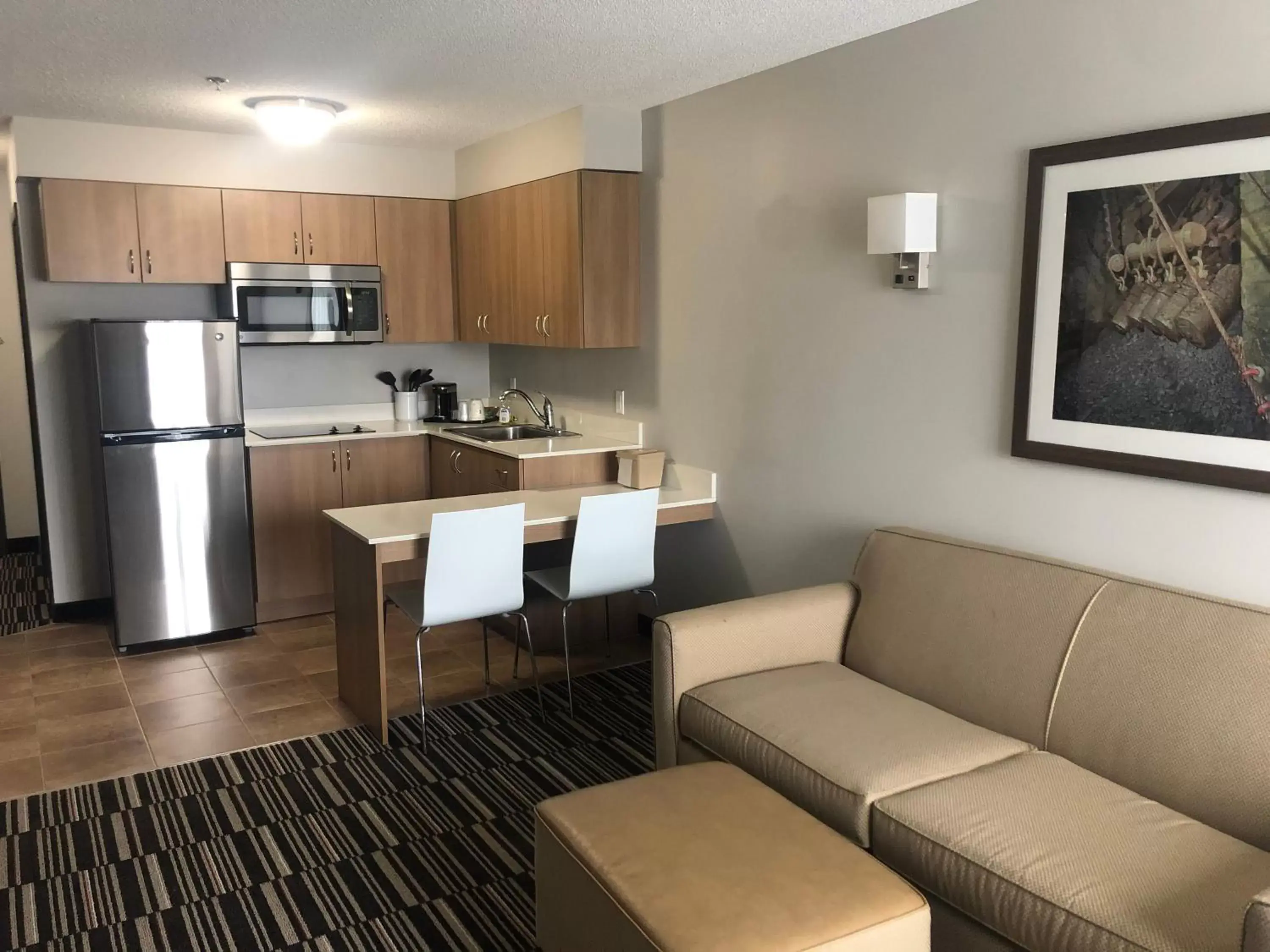 Kitchen or kitchenette in Microtel Inn & Suites by Wyndham Sudbury