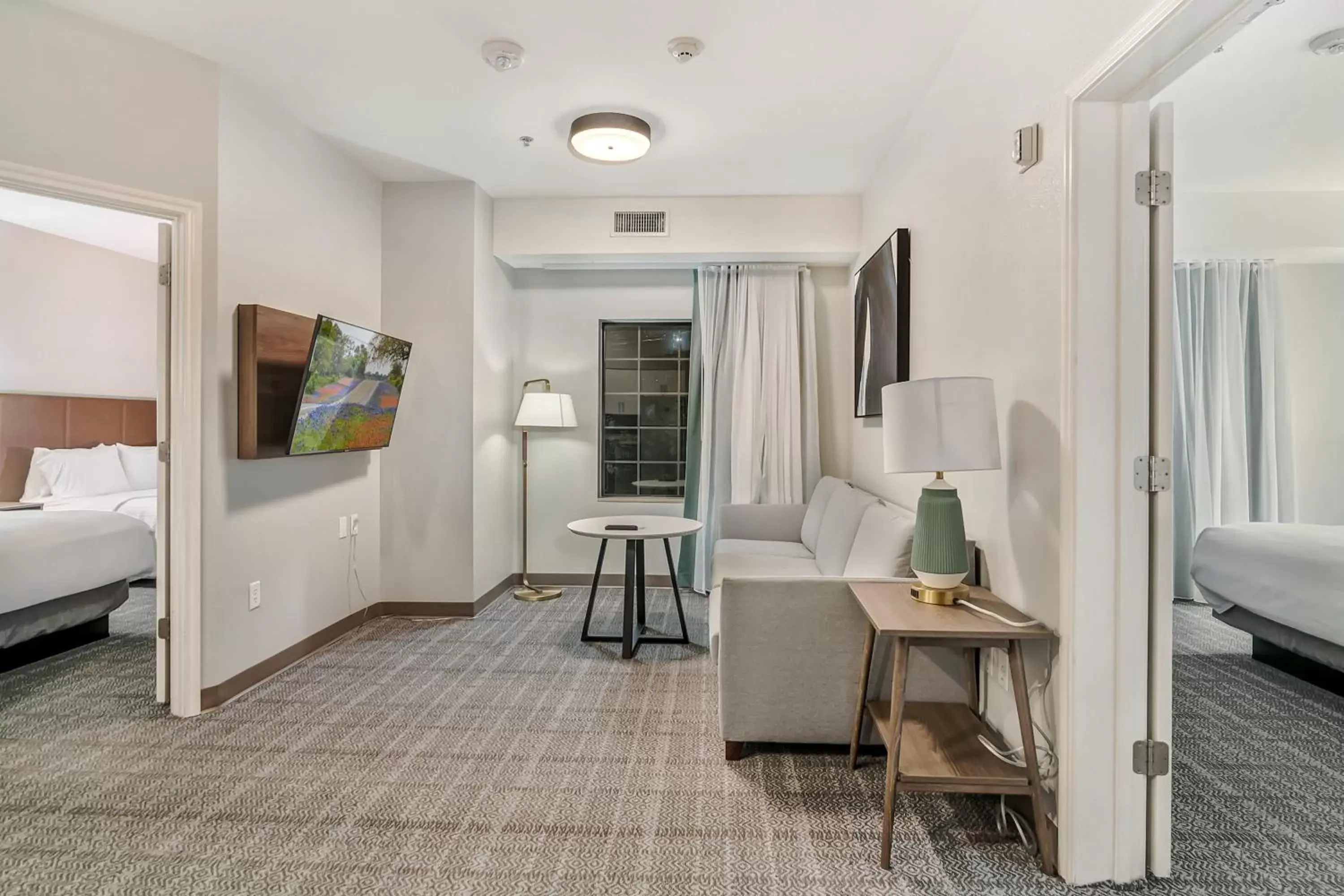 Photo of the whole room, Seating Area in Staybridge Suites Tyler University Area, an IHG Hotel