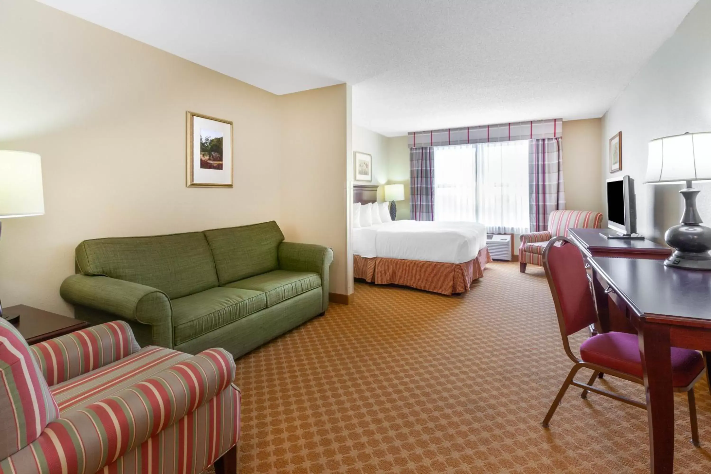 Seating Area in AmericInn by Wyndham Iron Mountain