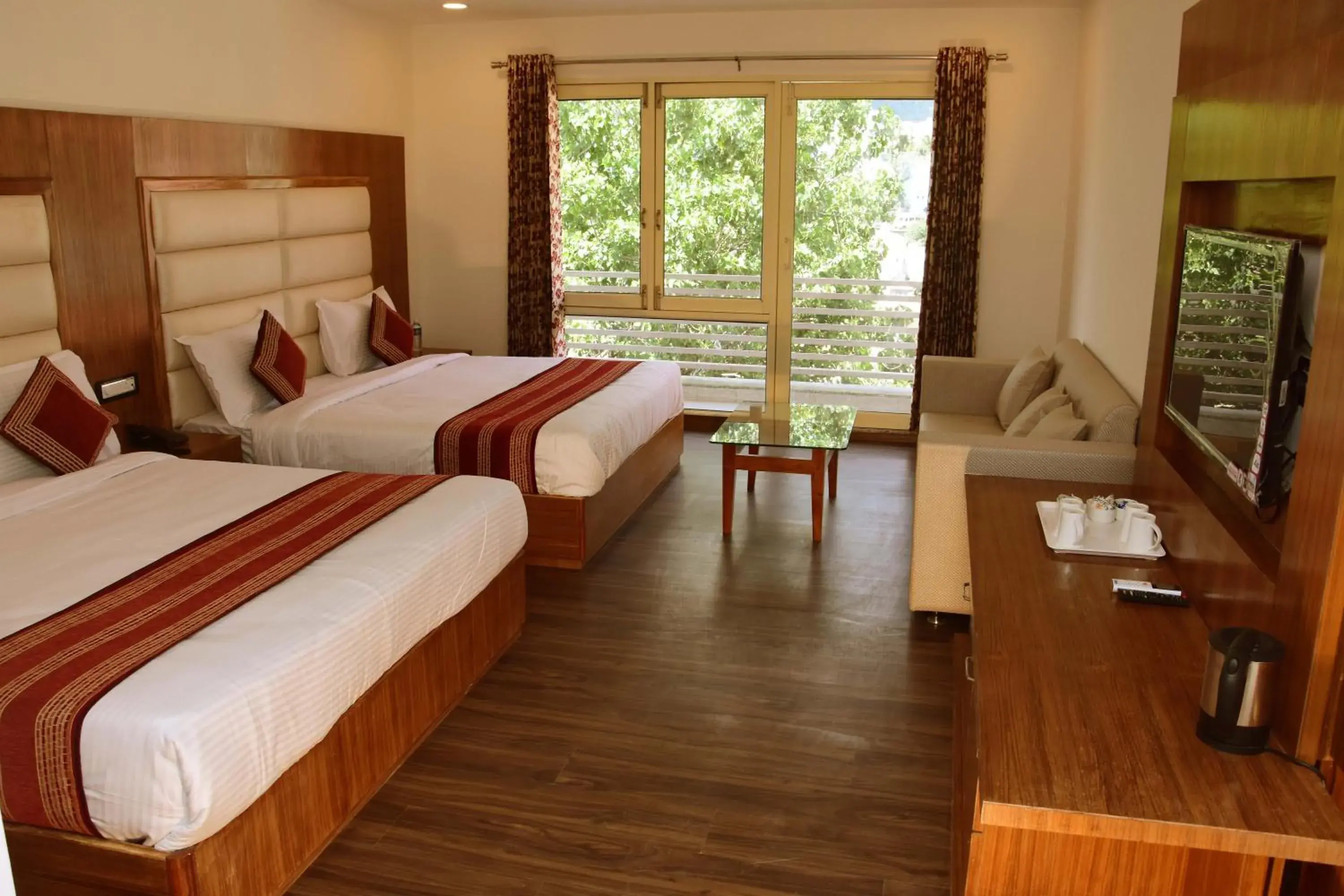 Bedroom in Hotel Rama Trident