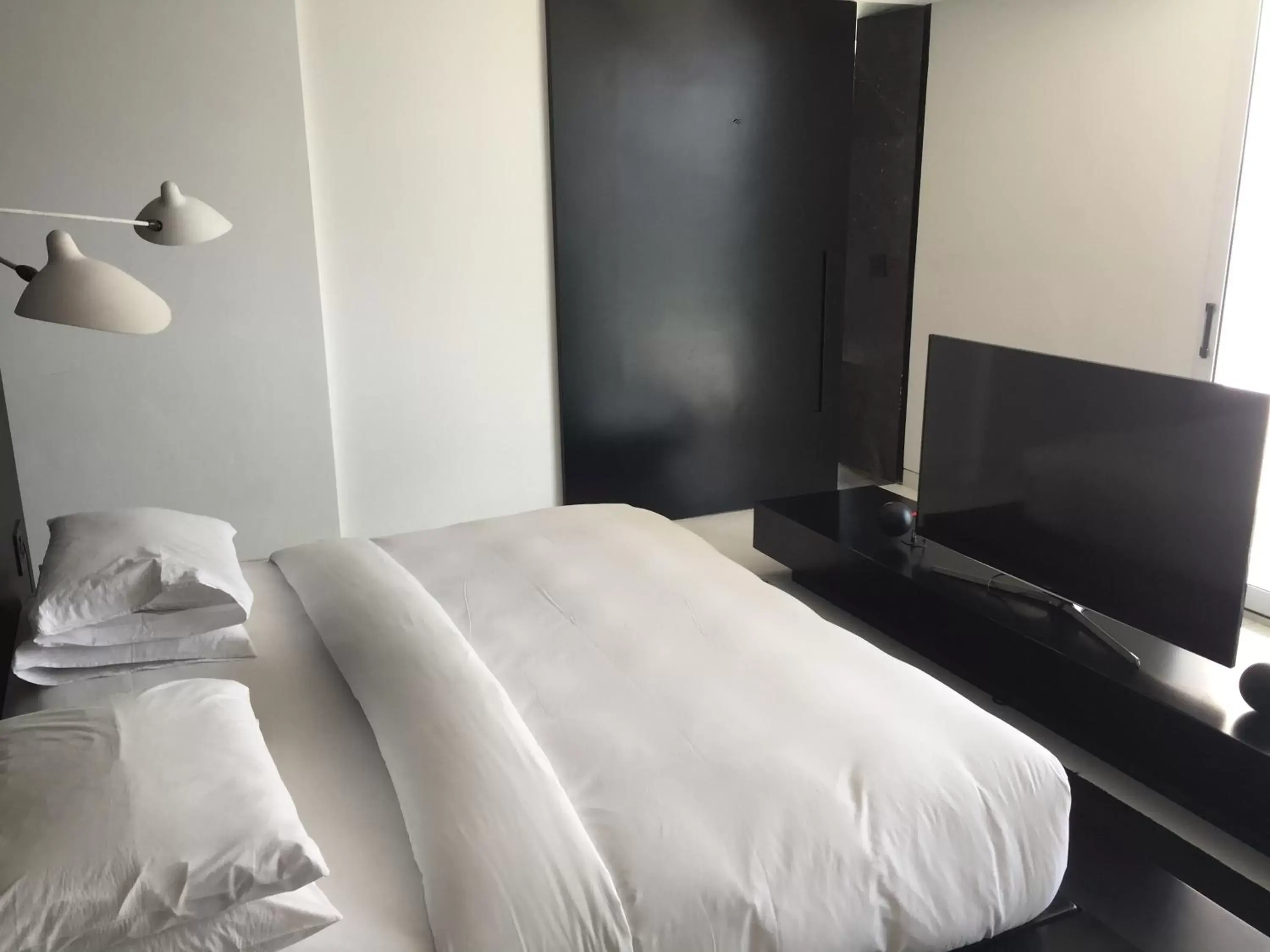 Bed in Habita Monterrey, a Member of Design Hotels