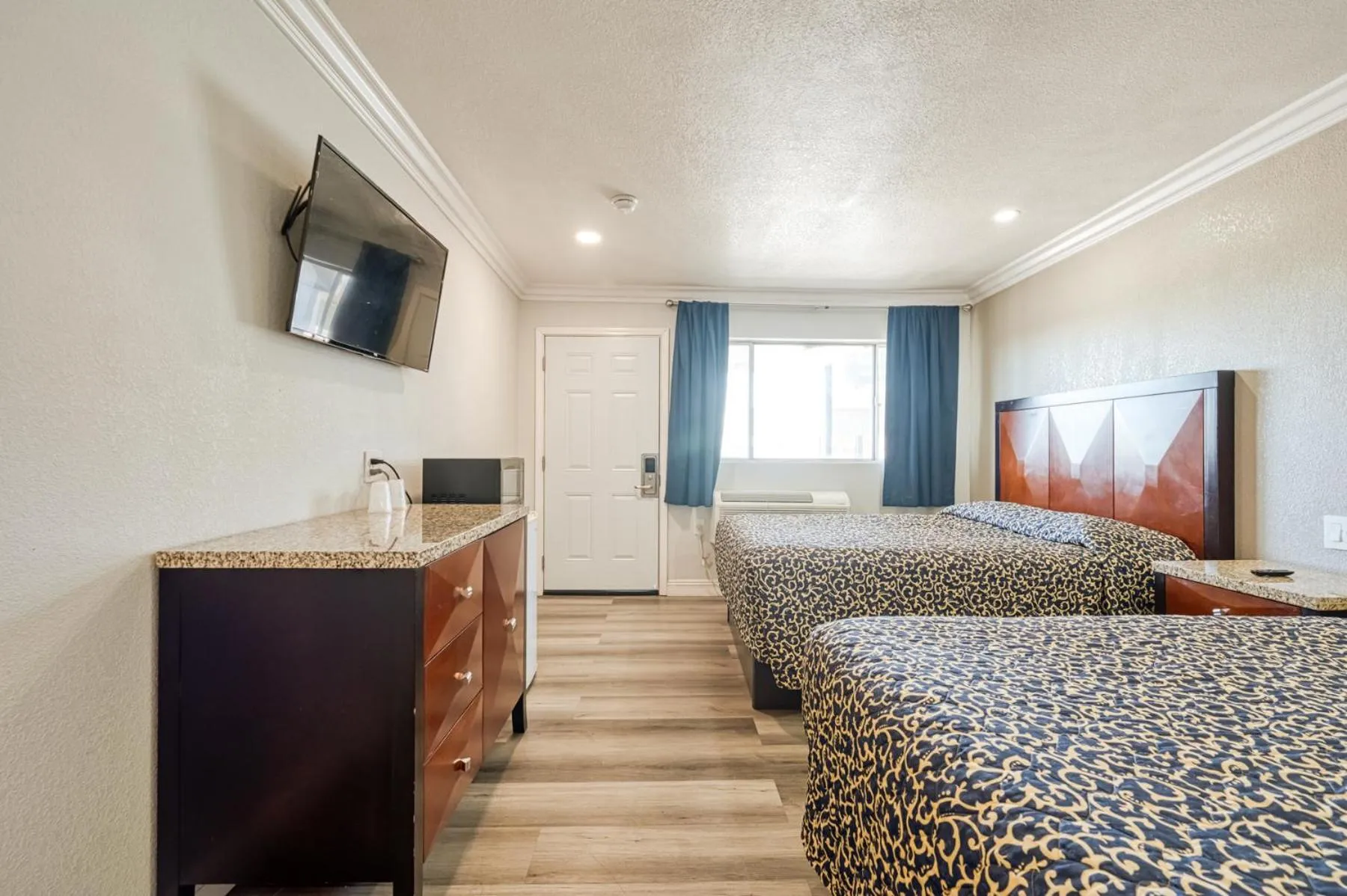 Bed in ERTH INN by AGA- Mojave