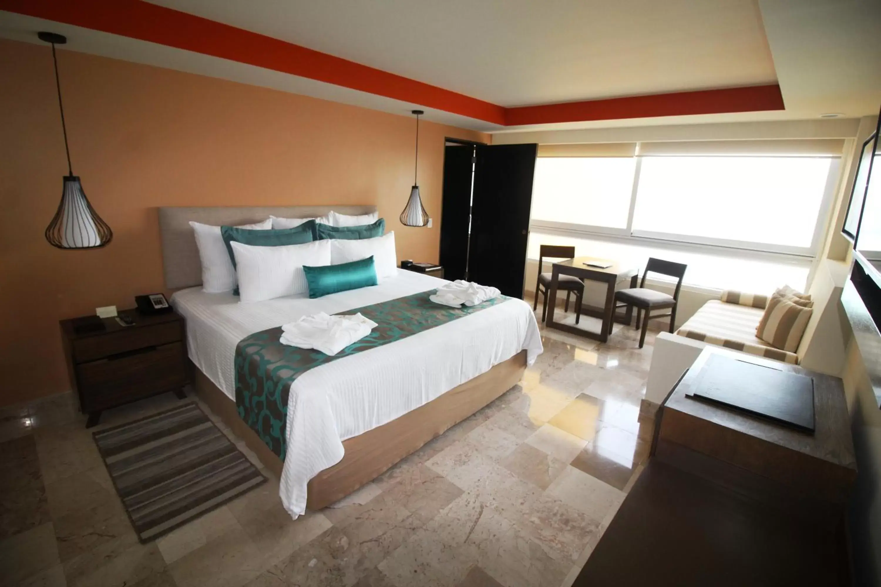 Bedroom in Dreams Sands Cancun Resort & Spa