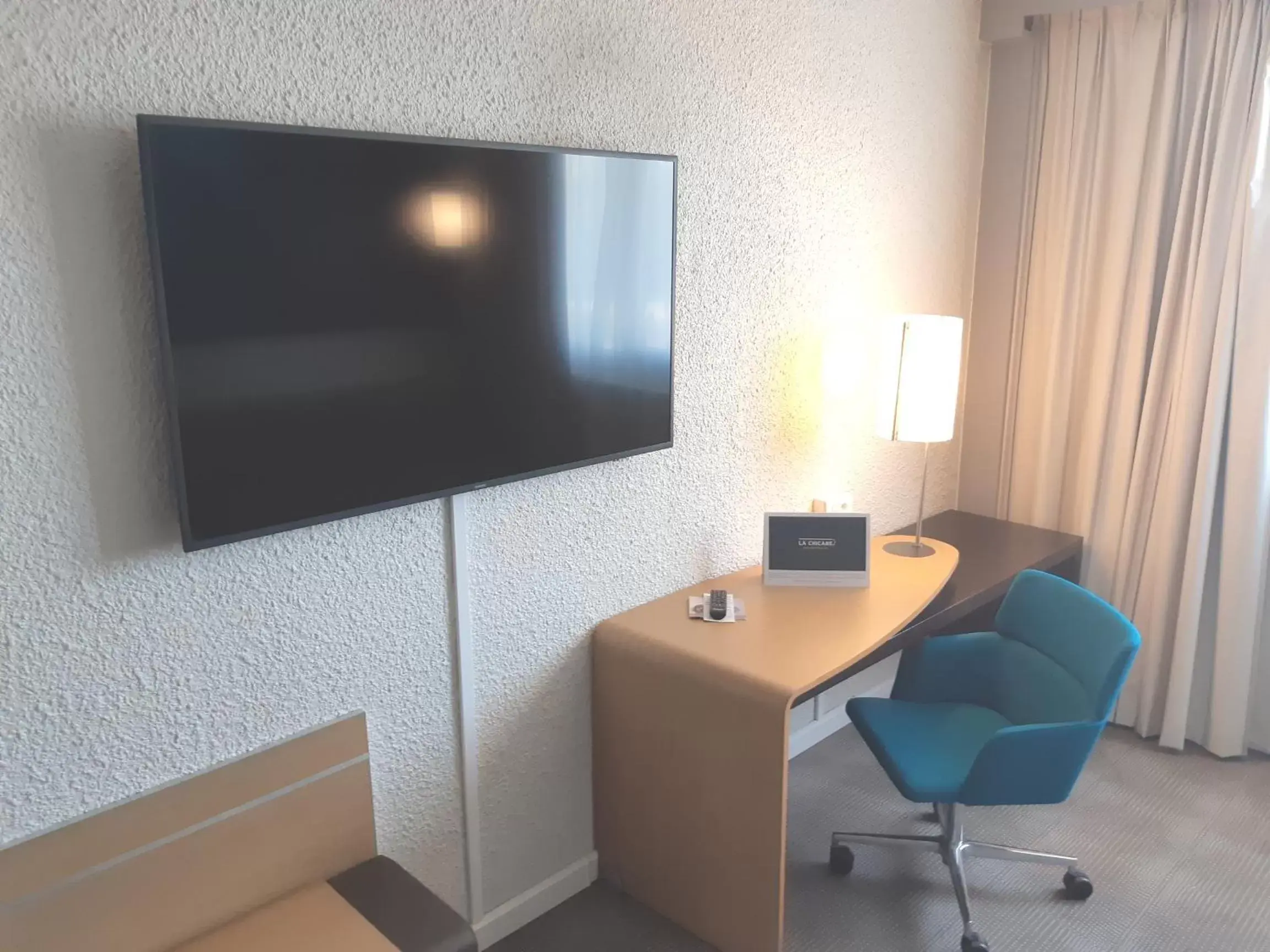 TV and multimedia, TV/Entertainment Center in Novotel Le Mans