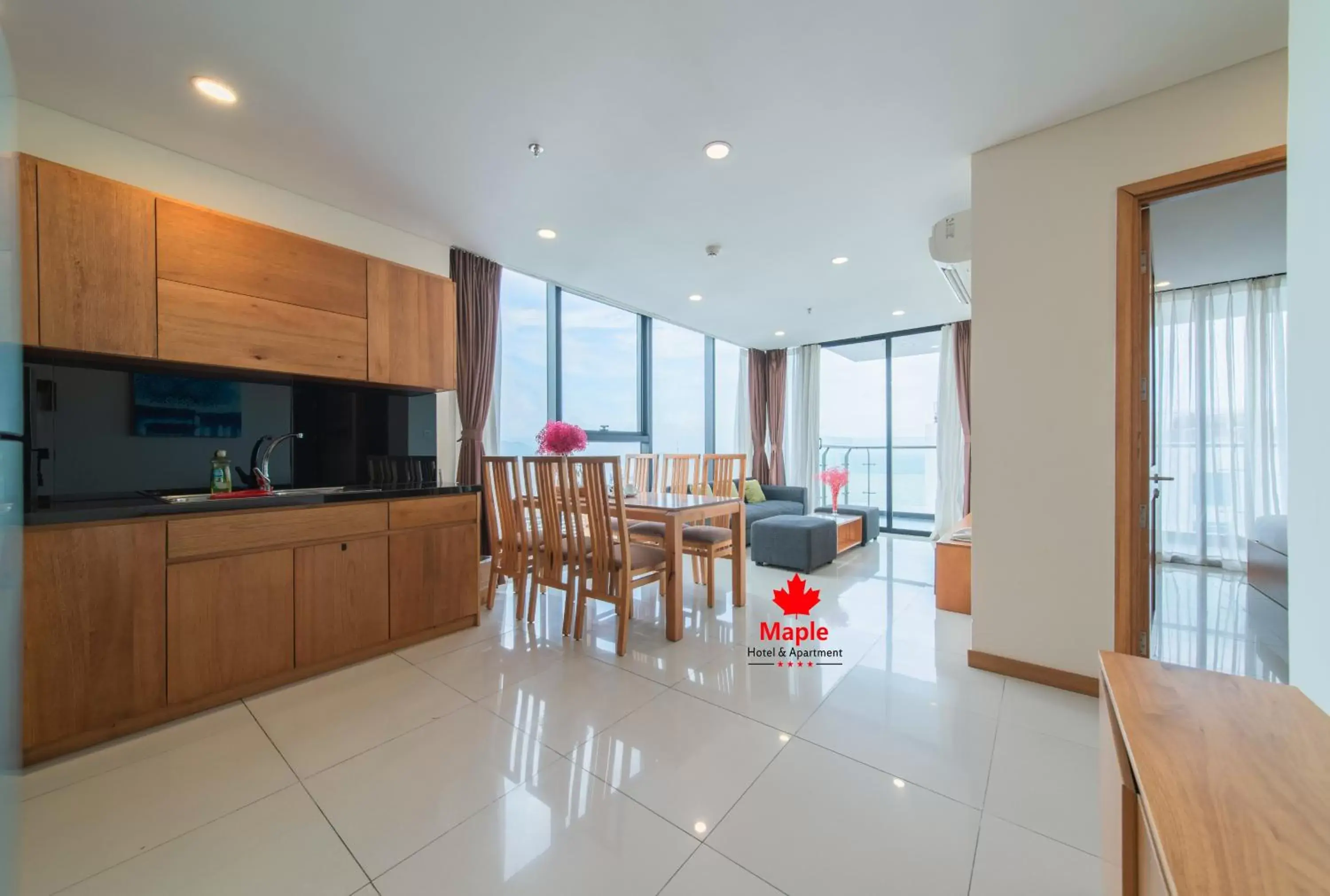 Living room, Kitchen/Kitchenette in Maple Hotel & Apartment