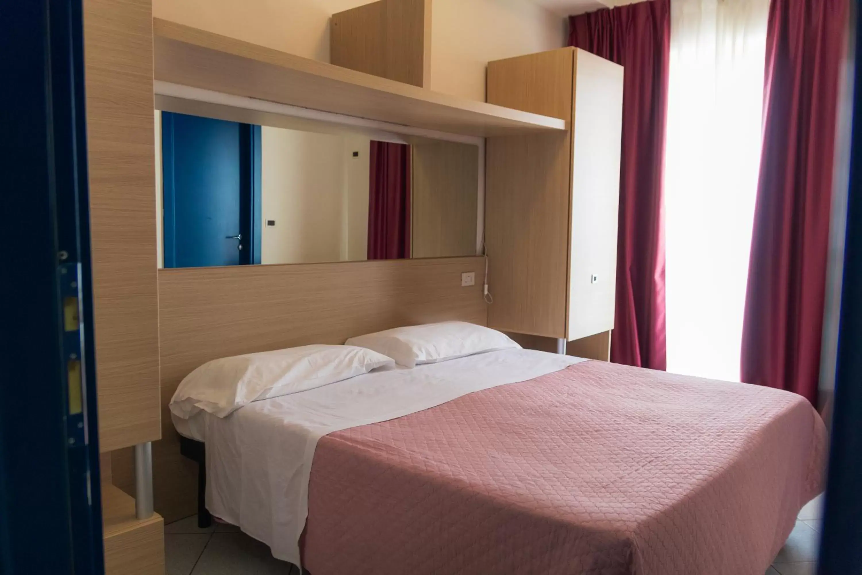 Bed in Hotel Felicioni