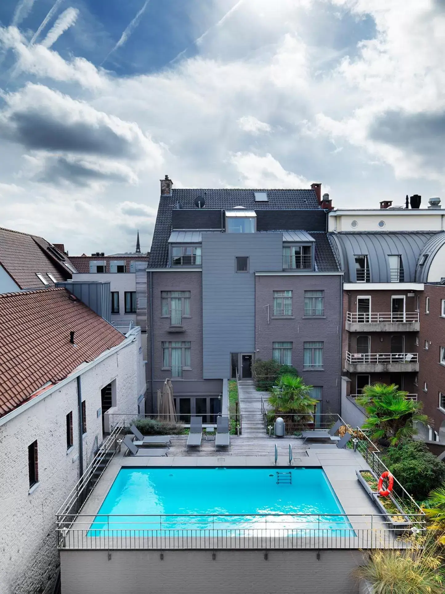 Property building, Swimming Pool in Hotel Harmony