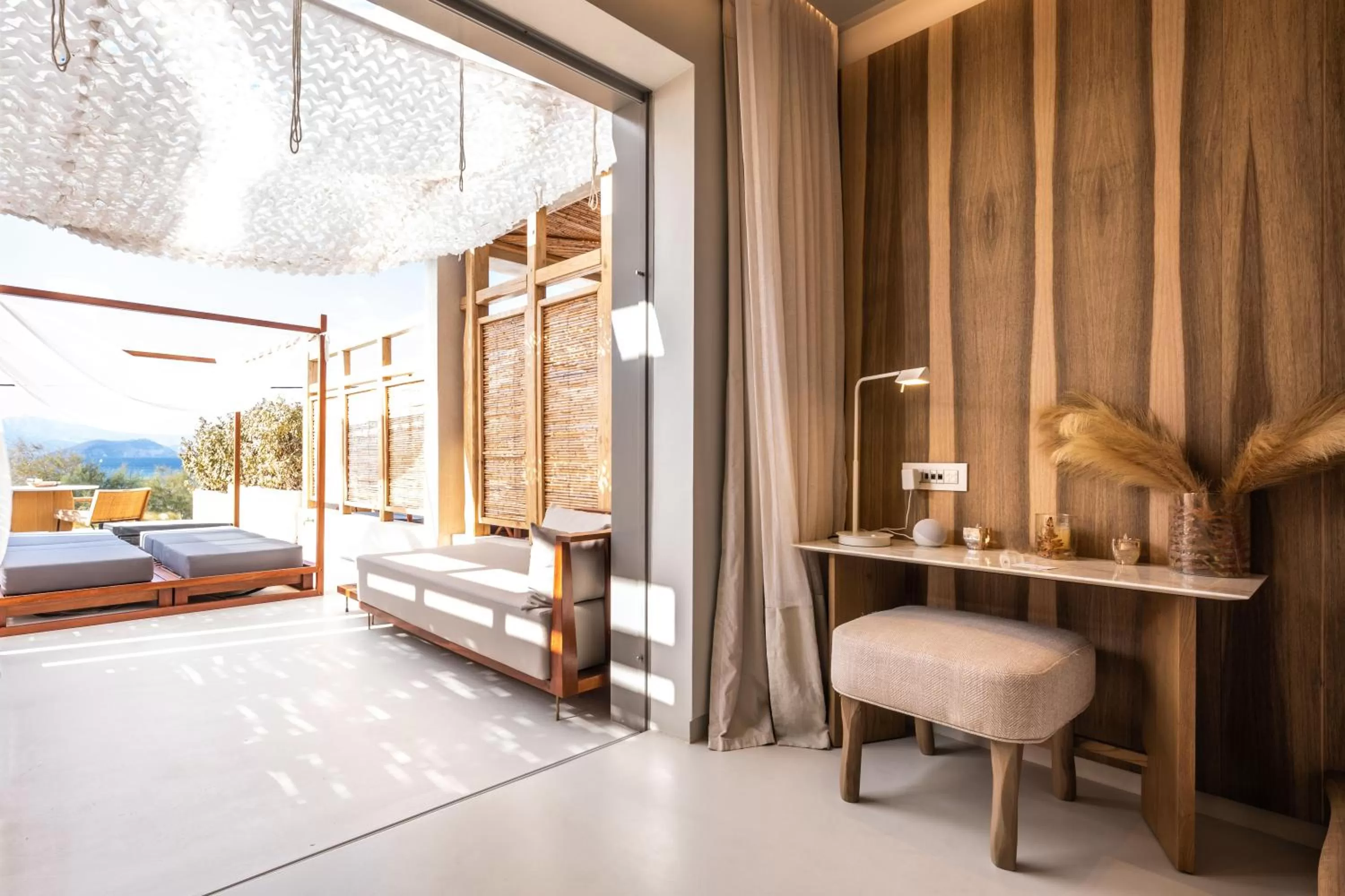 Seating area, Bed in Avgoustos Suites Naxos