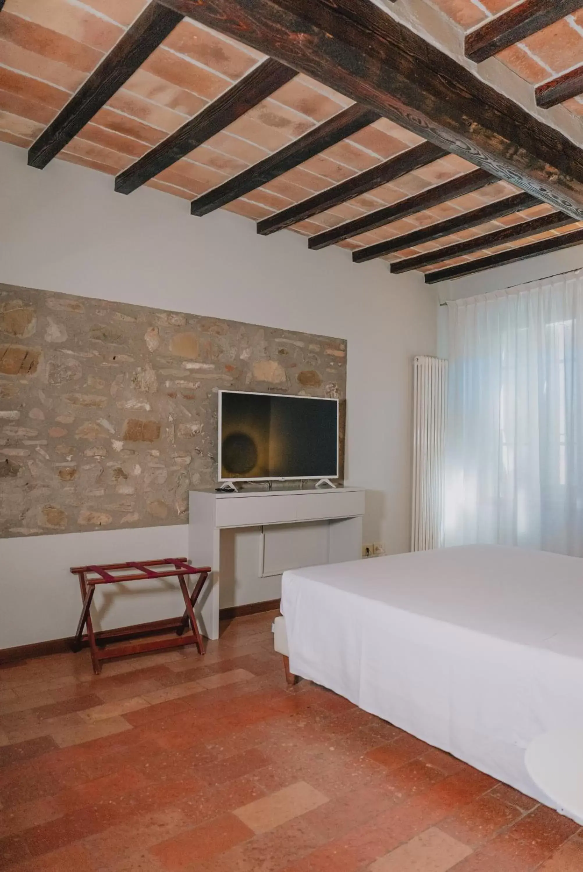 Bed, TV/Entertainment Center in Locanda Del Feudo