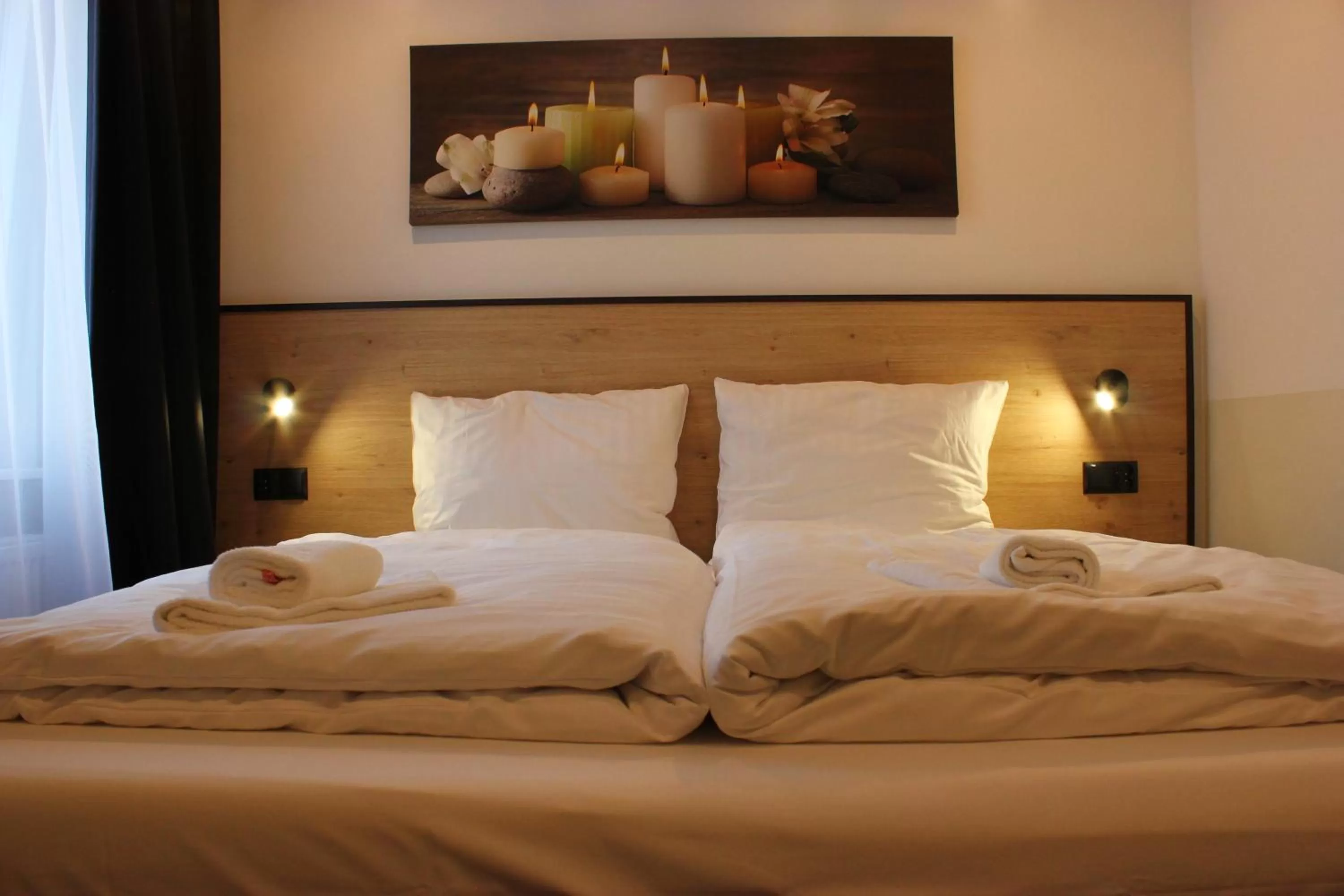 Bed in JJ Hotel Hannover-City-Pension