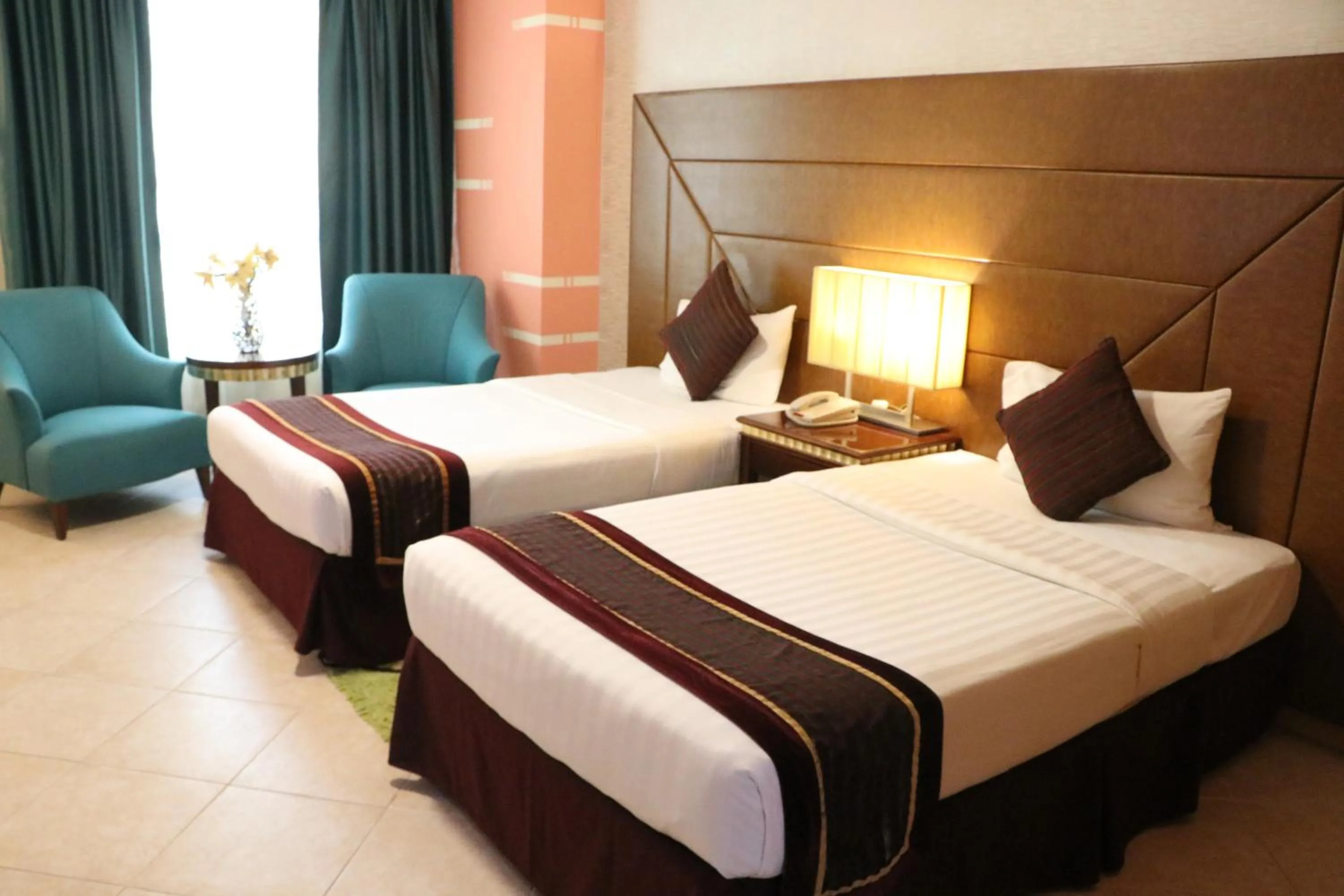 Bed in Al Manar Grand Hotel Apartment