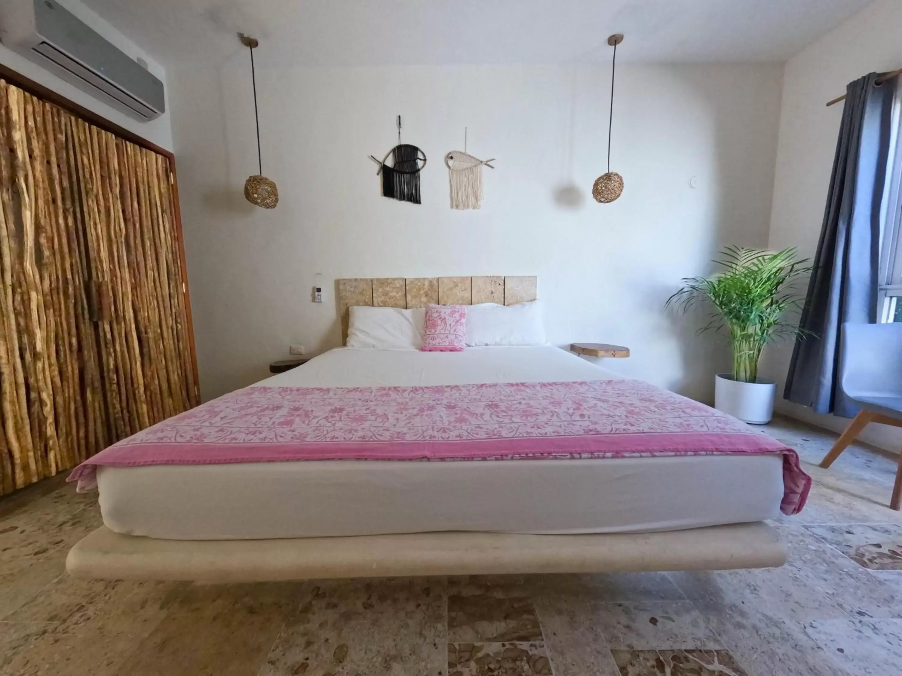 Bed in Rustik-inn Rooms