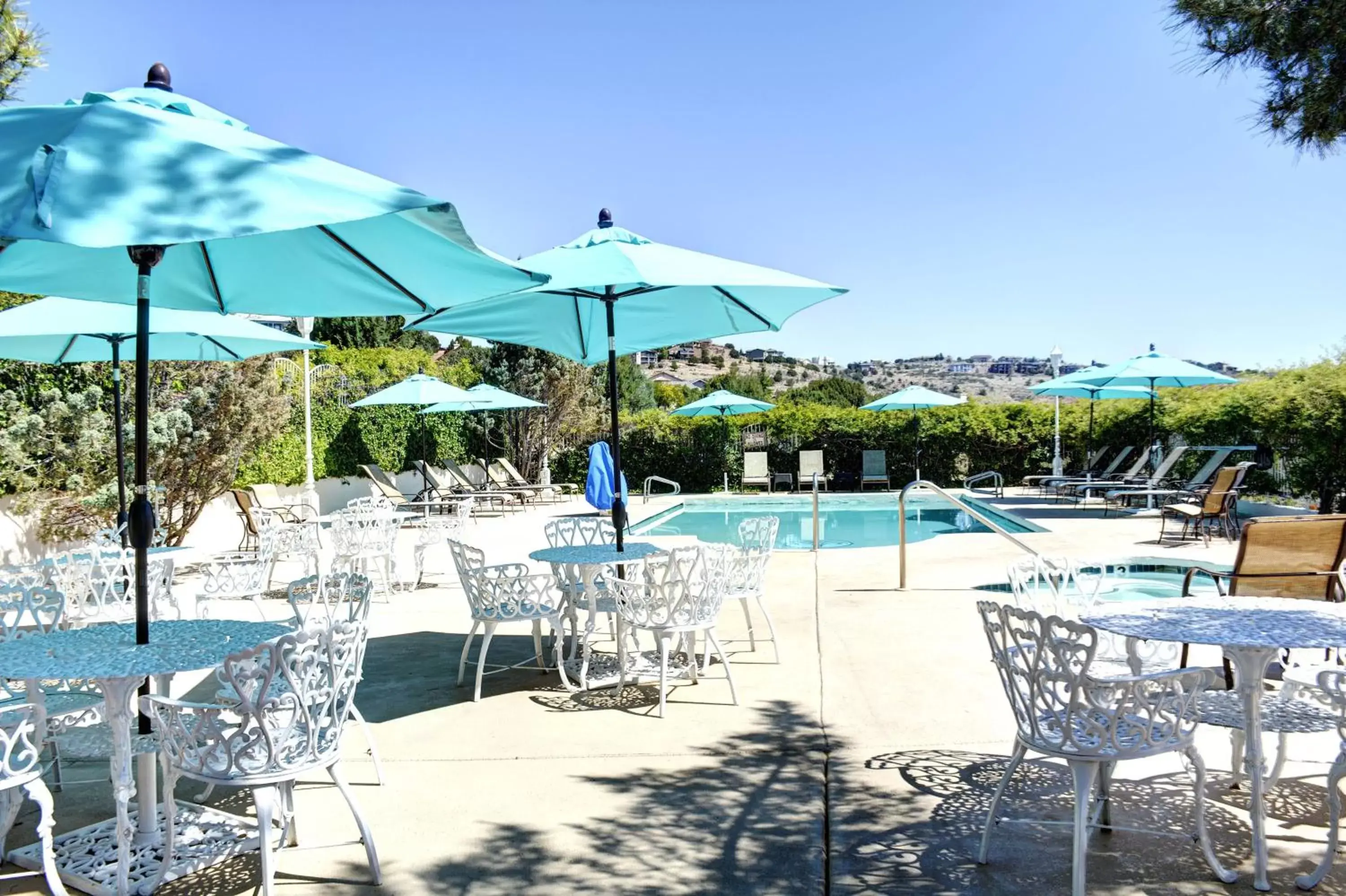 Patio, Swimming Pool in Forest Villas Hotel