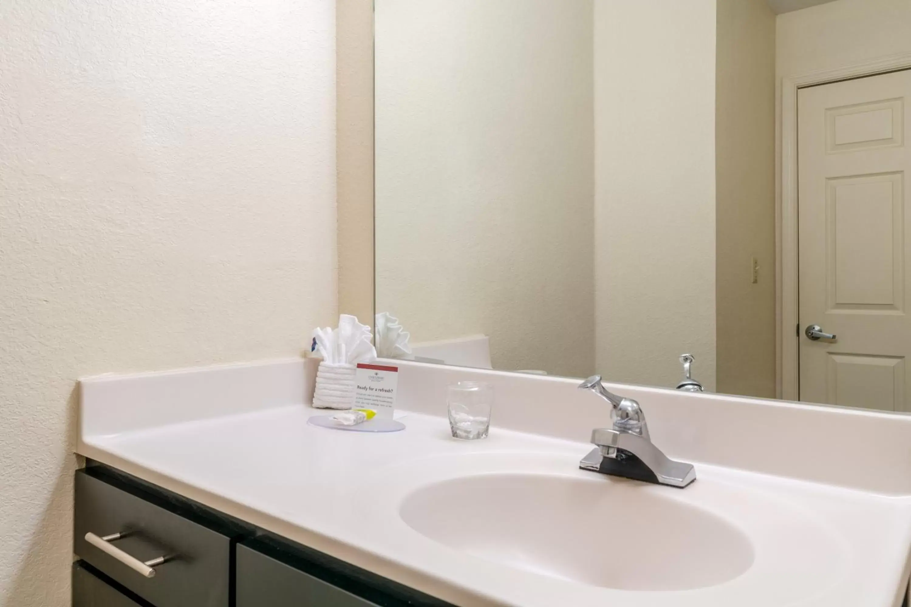 Bathroom in Candlewood Suites Washington-Fairfax, an IHG Hotel