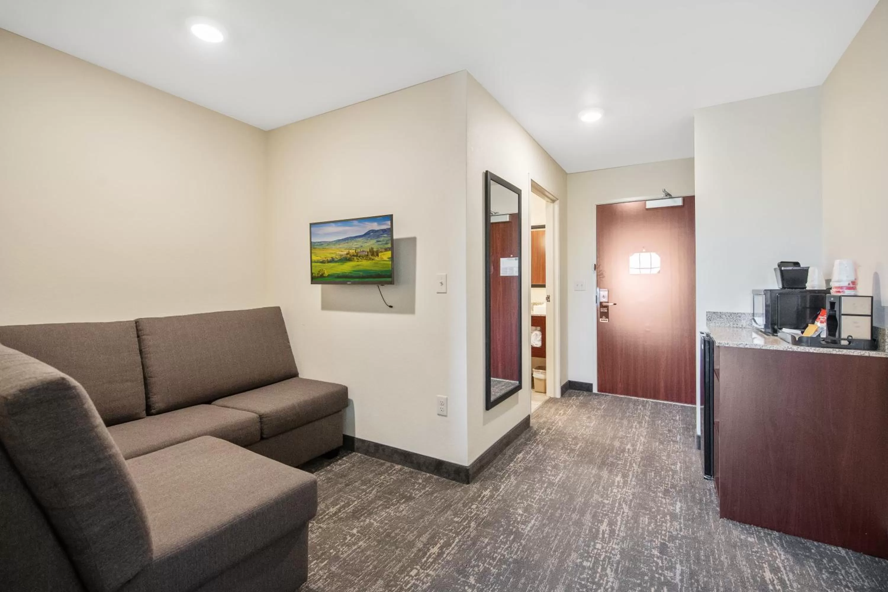 Seating area in Cobblestone Hotel & Suites - Austin