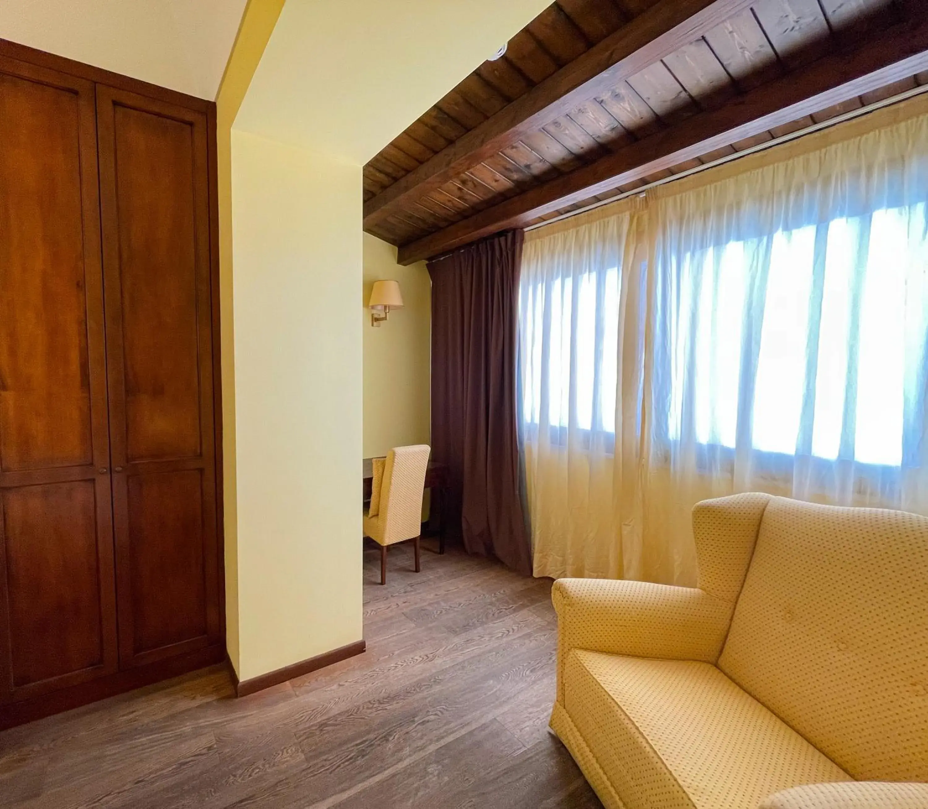 Bedroom, Seating Area in Hotel La Plumeria