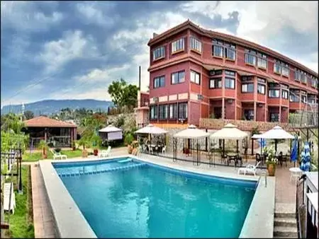 Property building, Swimming Pool in Hotel River Side