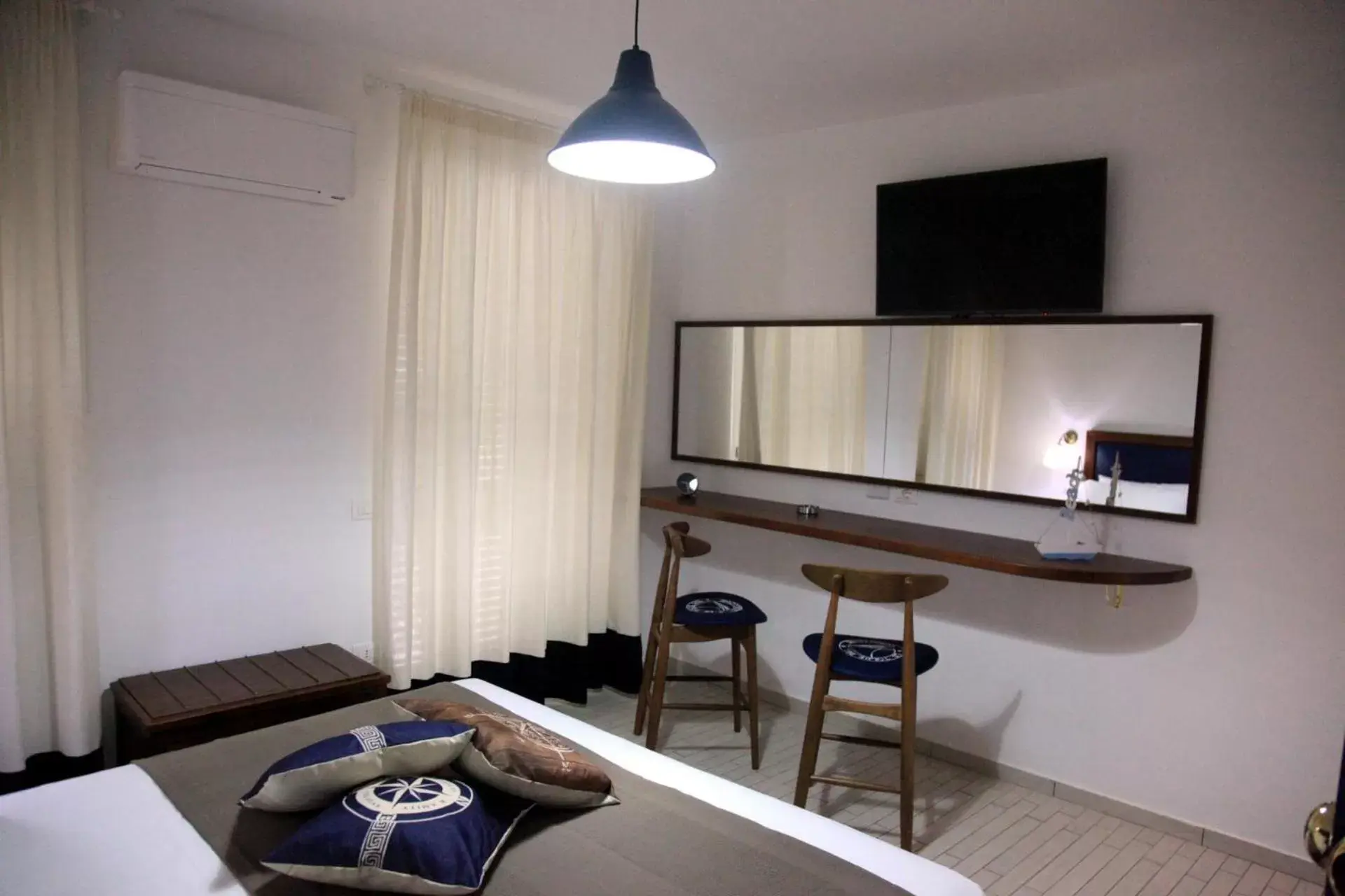 Bedroom, TV/Entertainment Center in Le Tolde del Corallone