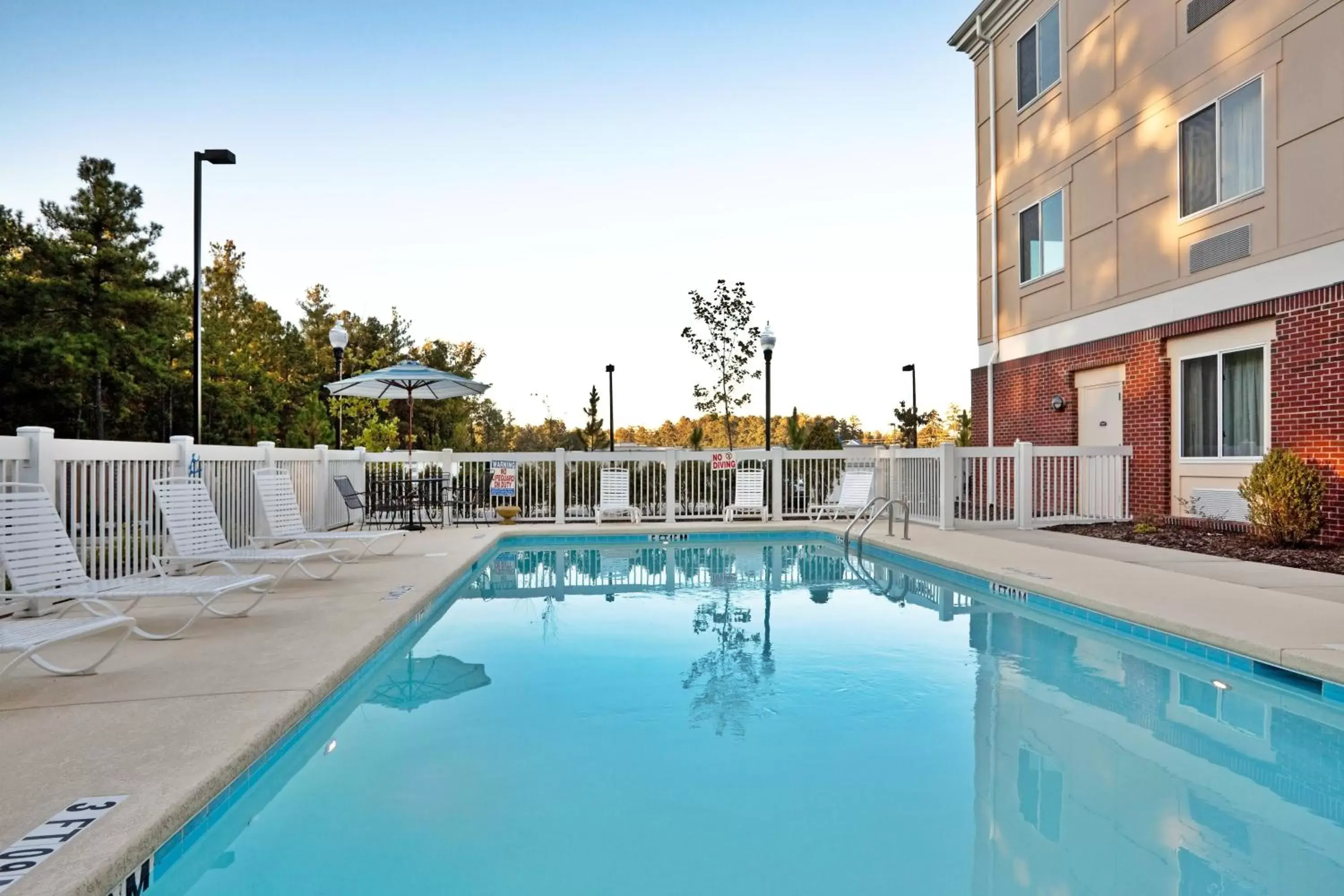 Swimming Pool in Holiday Inn Express & Suites Southern Pines-Pinehurst Area, an IHG Hotel