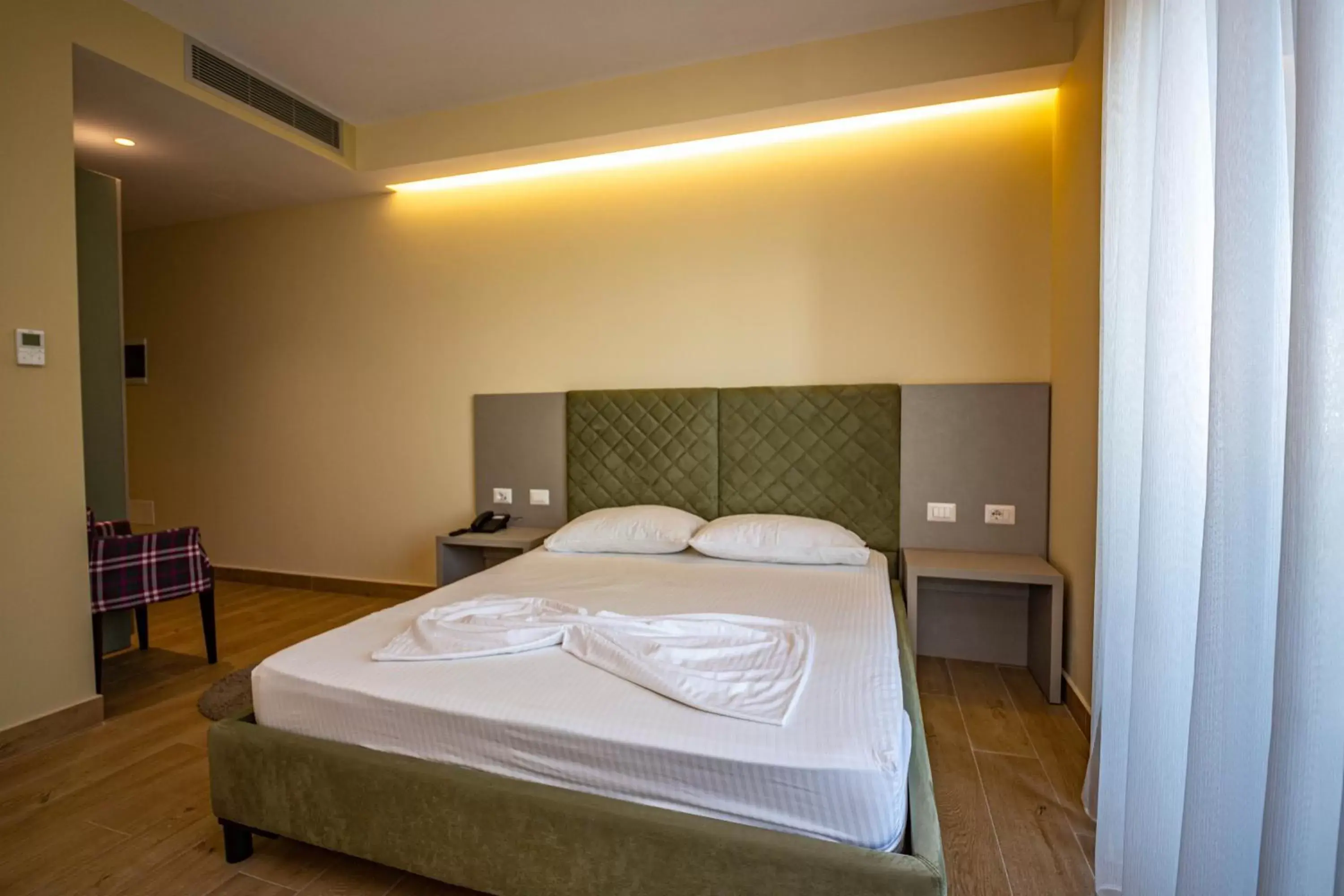 Double Room with Balcony and Side Sea View in Hotel Bella Vista Double Room with Balcony and Side Sea View in Hotel Bella Vista