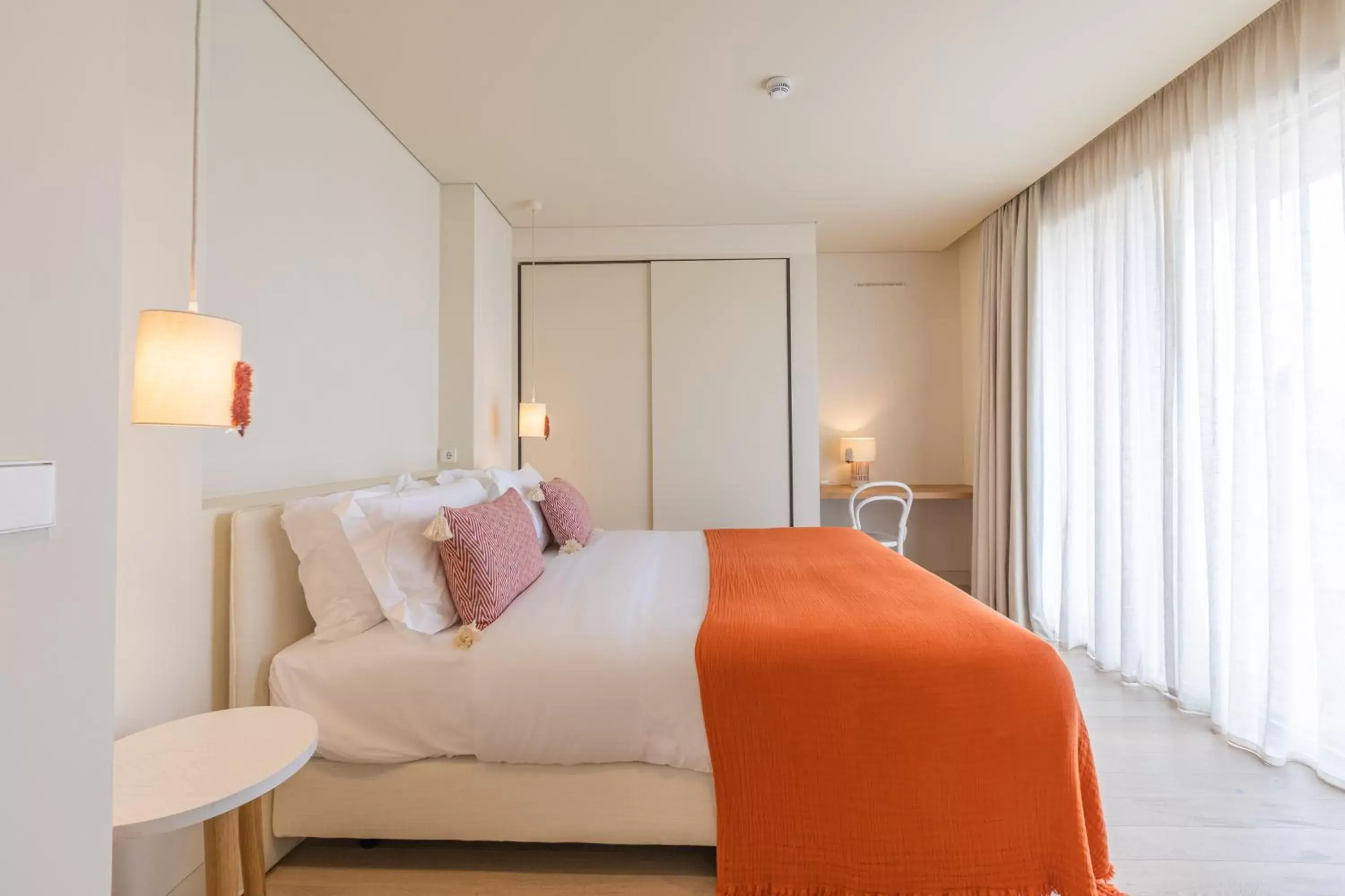 Bed in White Shell Beach Villas Bed in White Shell Beach Villas