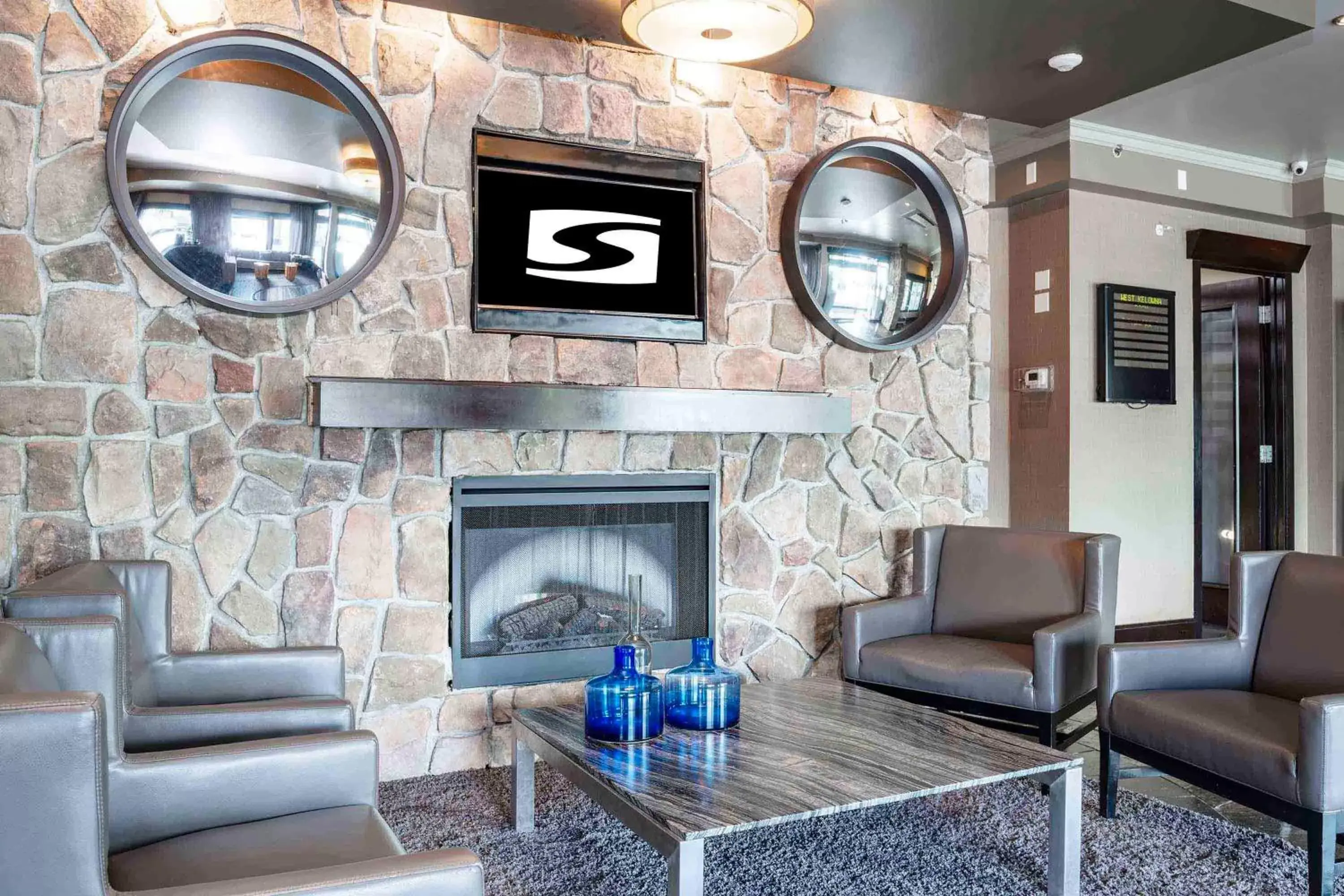 Lobby or reception in Sandman Hotel & Suites Kelowna Lobby or reception in Sandman Hotel & Suites Kelowna