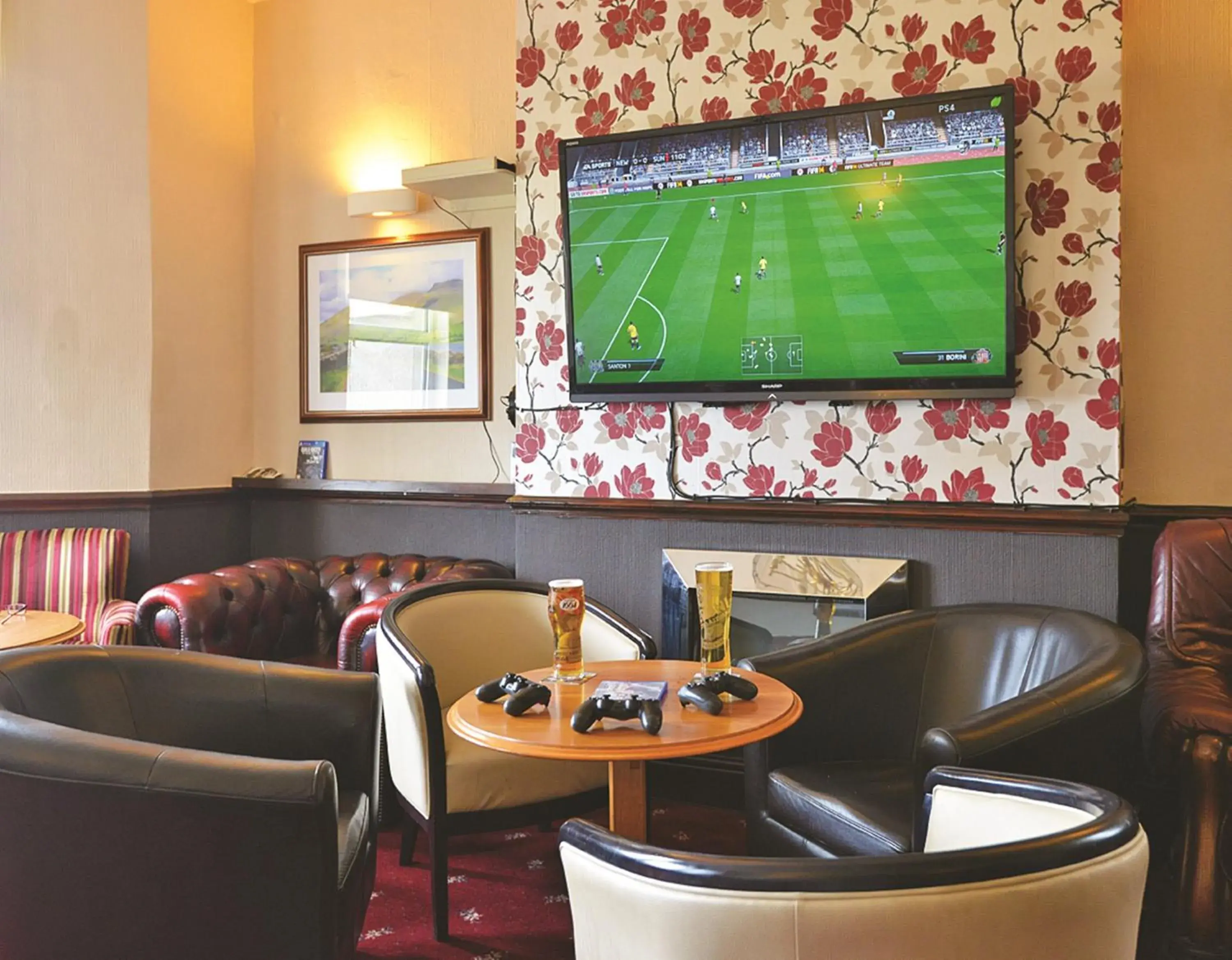 Lounge or bar, TV/Entertainment Center in Bailey Ground Hotel
