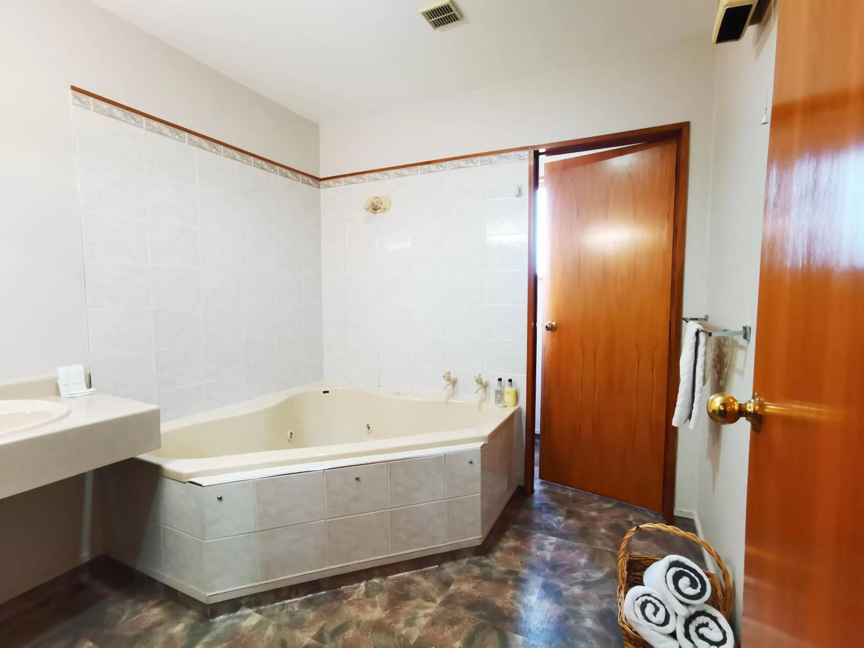Bathroom in ASURE Ambassador Motor Lodge