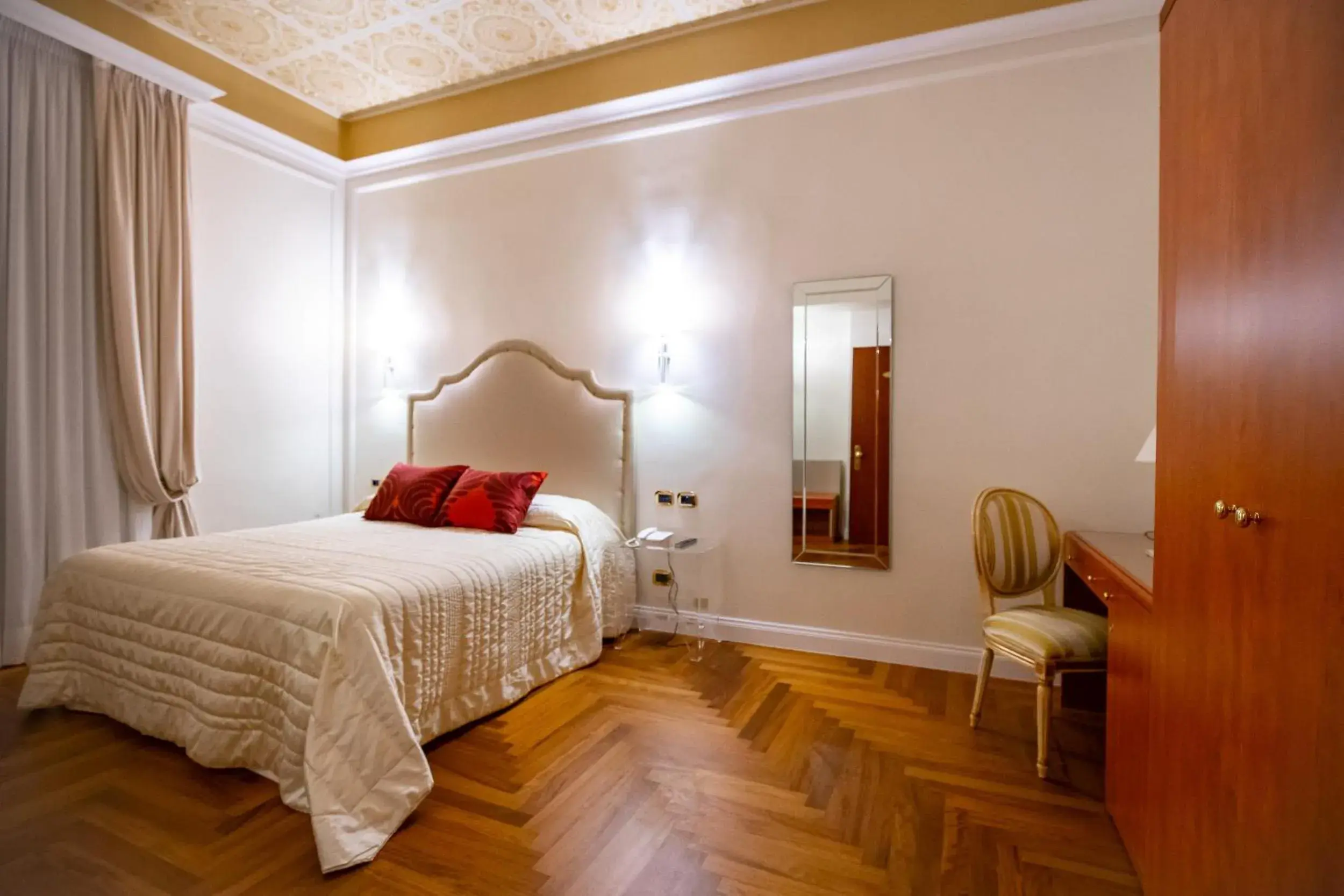 Bed in Hotel Puccini